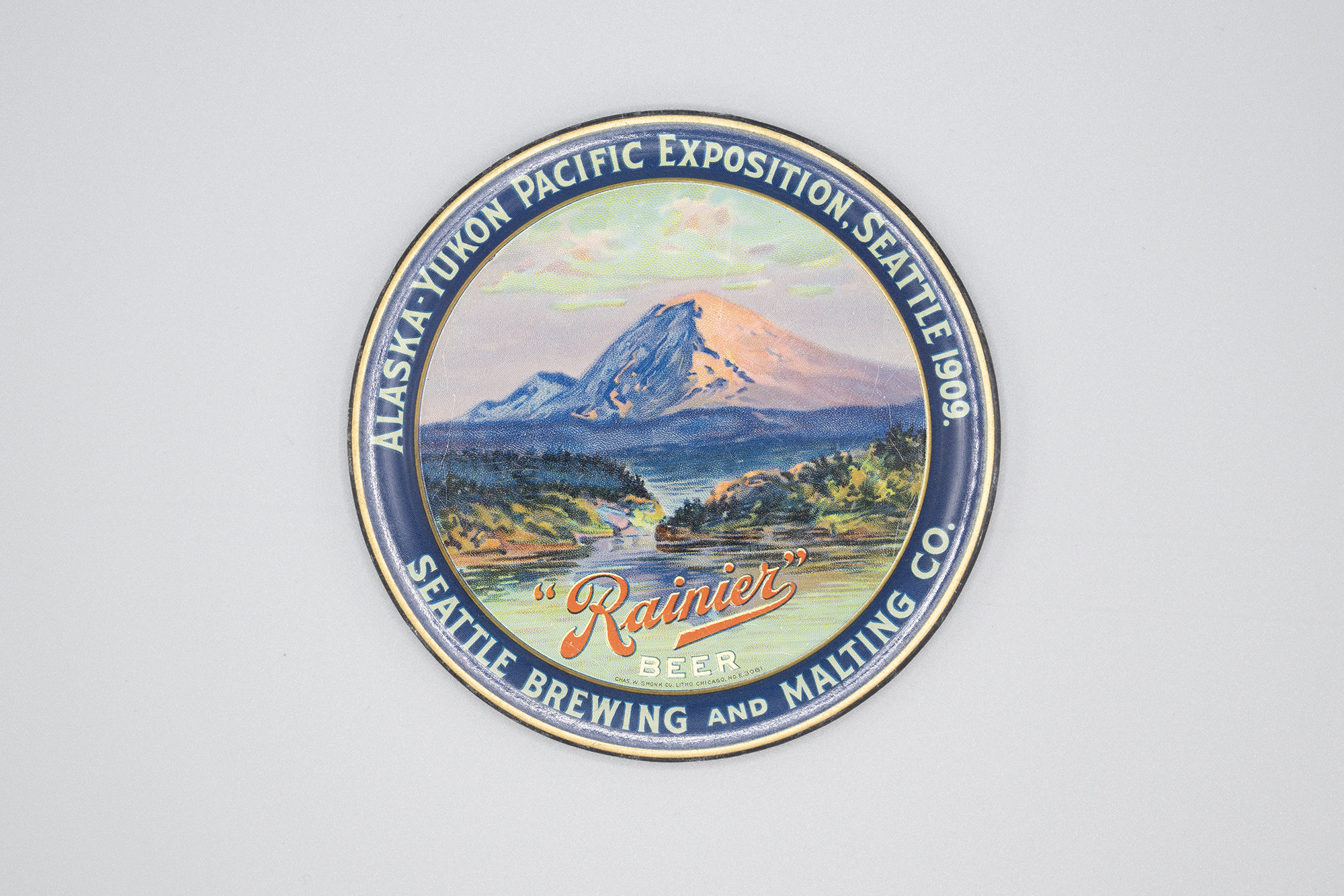 Image of Coaster advertising Rainier Beer and the AYPE, 1909