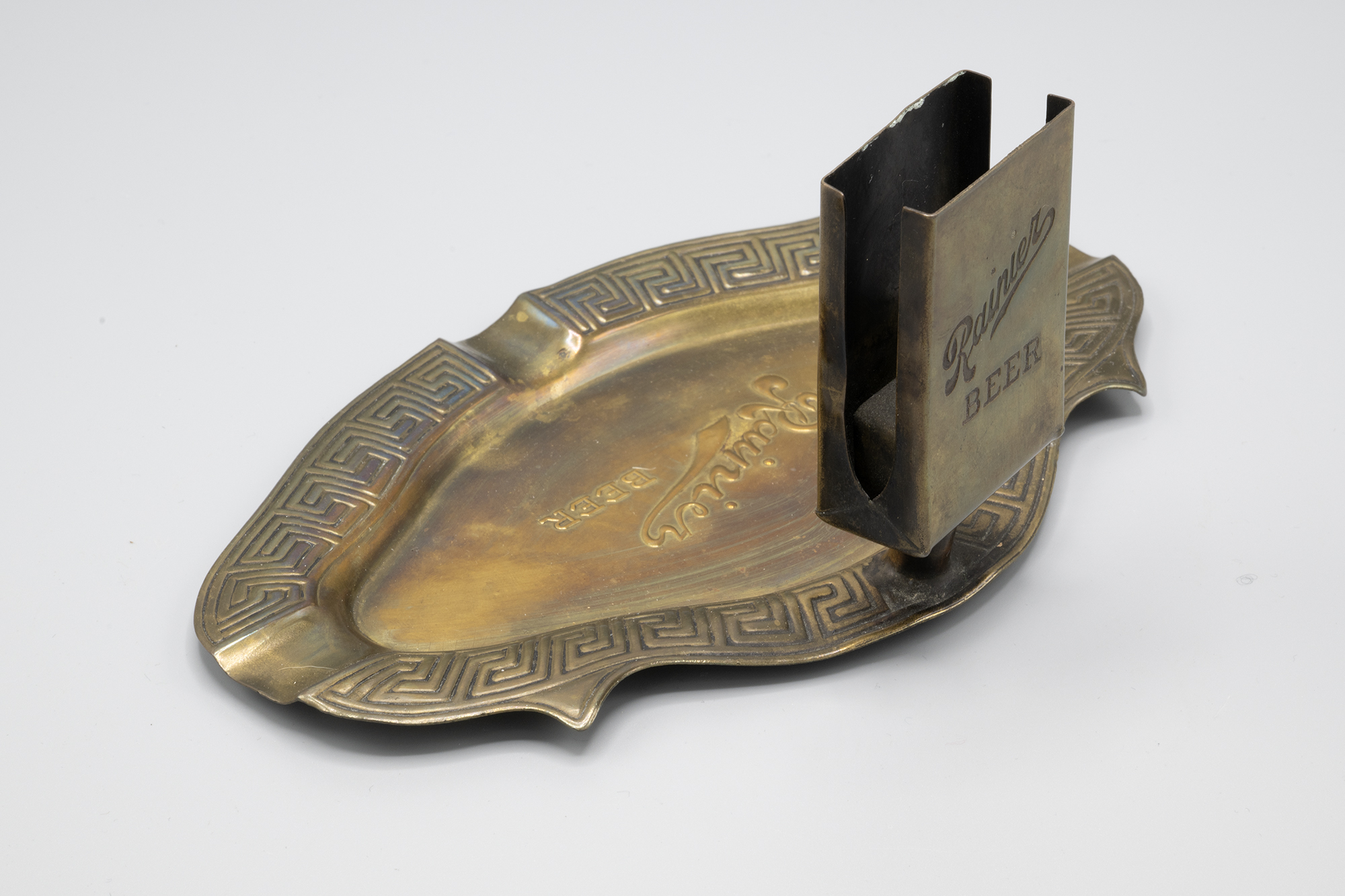 Image of Ash tray advertising Rainier Beer from Seattle Brewing and Malting Company, ca. 1900