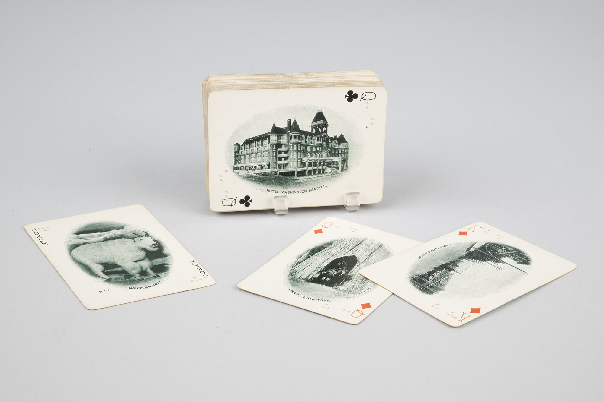 Image of Deck of cards with Pacific Northwest scenes and braille, ca. 1900