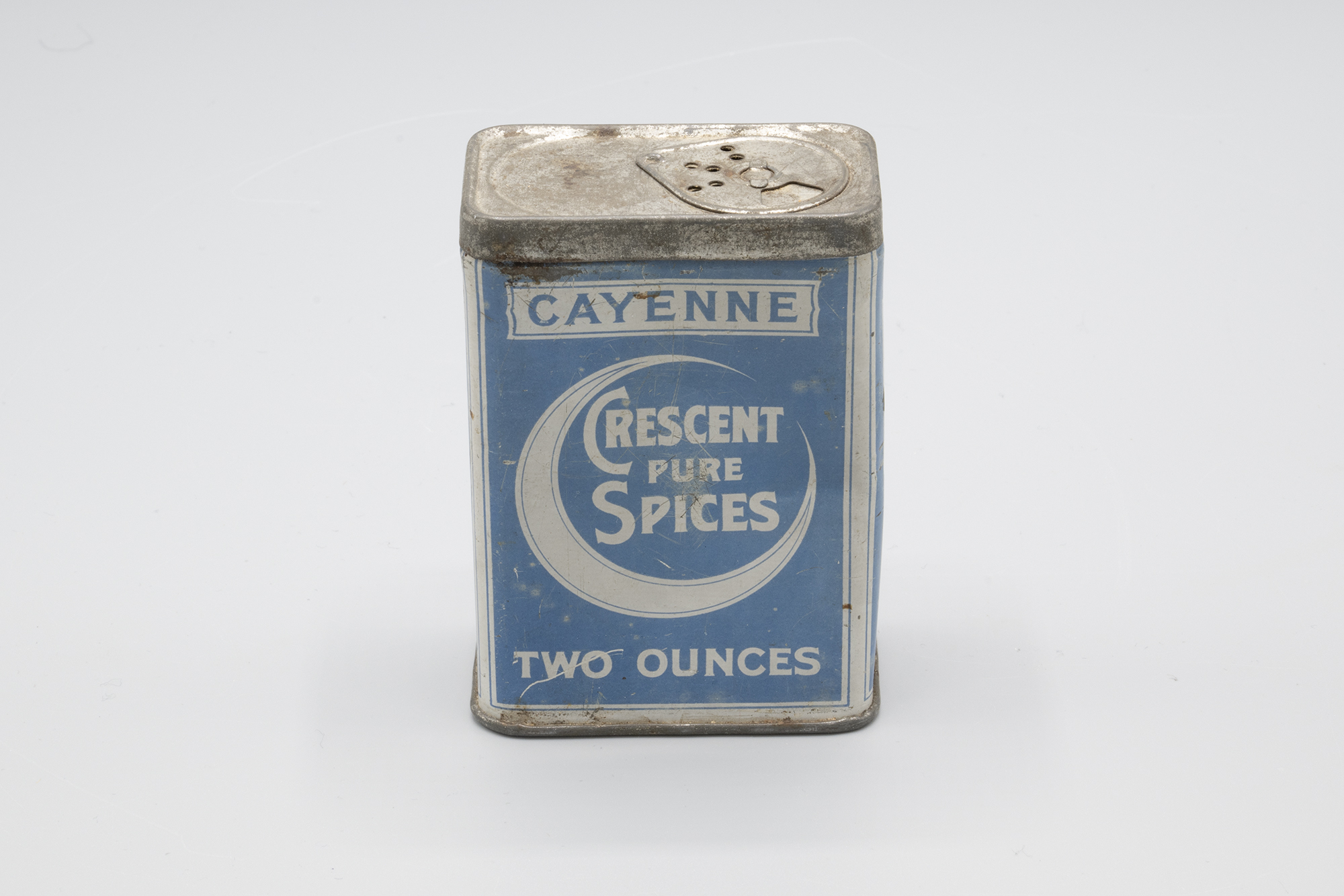 Image of Tin of cayenne pepper from Crescent Pure Spices, ca. 1910