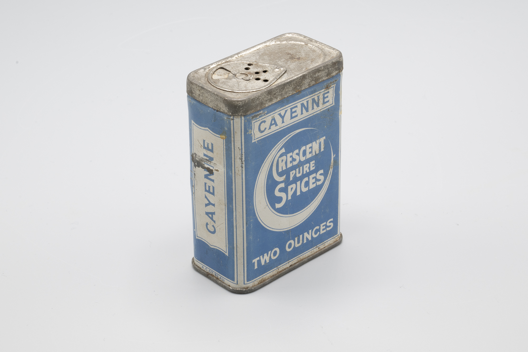 Image of Tin of cayenne pepper from Crescent Pure Spices, ca. 1910