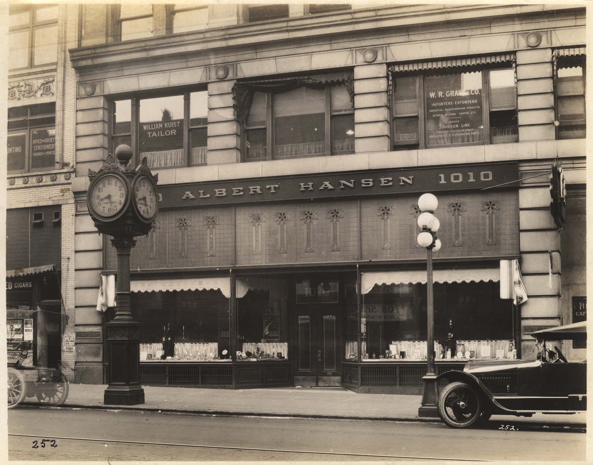 Image of Street clock in front of Albert Hansen jeweler, Seattle, circa 1918