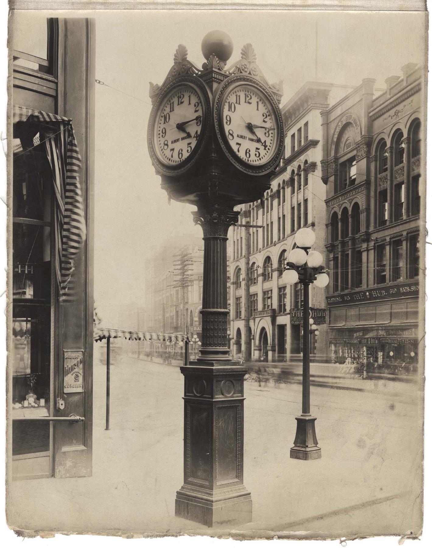 Image of Street clock in front of Albert Hansen jeweler, Seattle, circa 1910