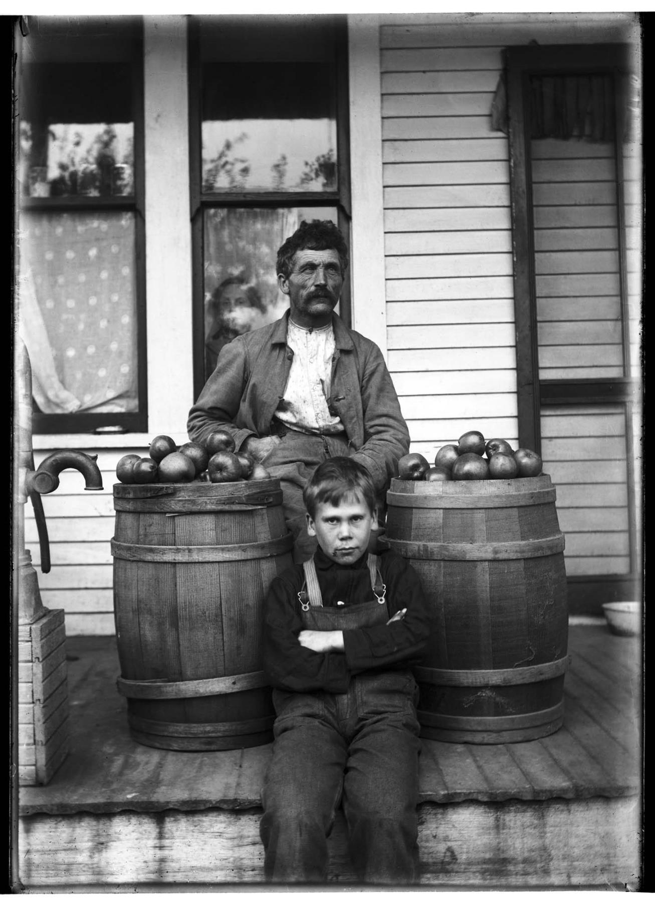 Image of Ole and Elmer Moen on porch, Seattle, circa 1910