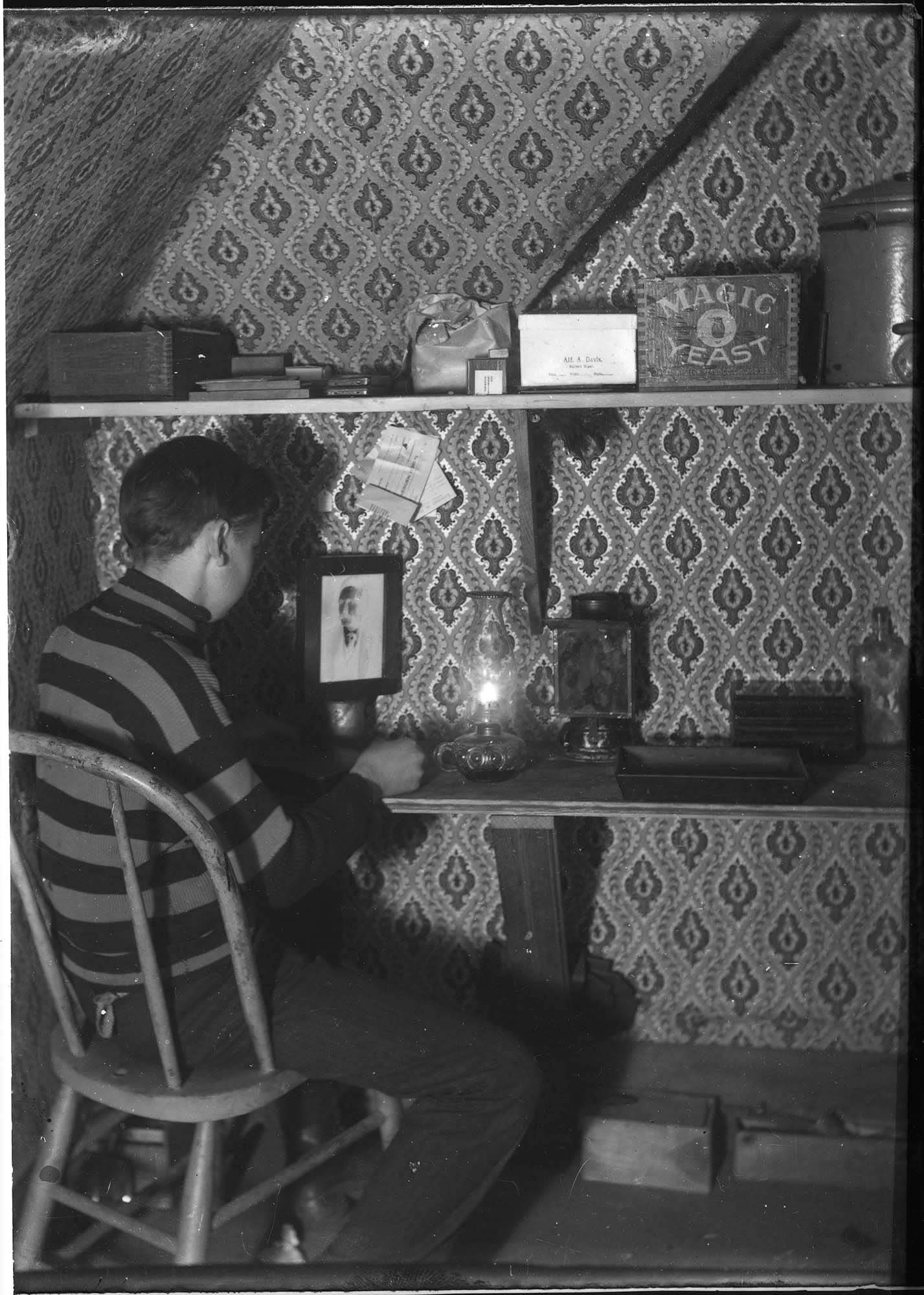 Image of Carl Henry Moen in his darkroom, Seattle, circa 1910