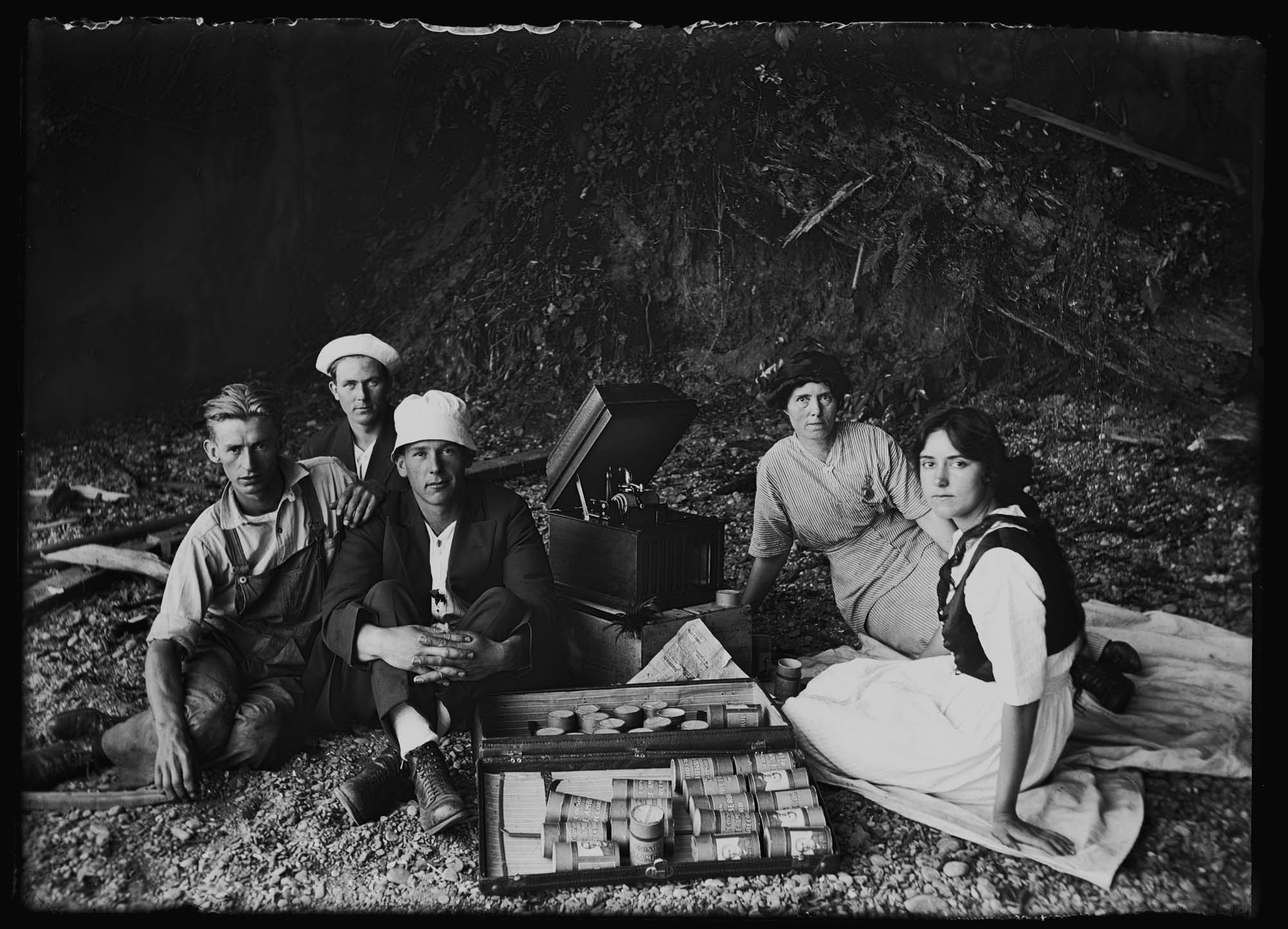Image of Group listening to wax cylinder recordings on Ballard Beach, Seattle, circa 1913