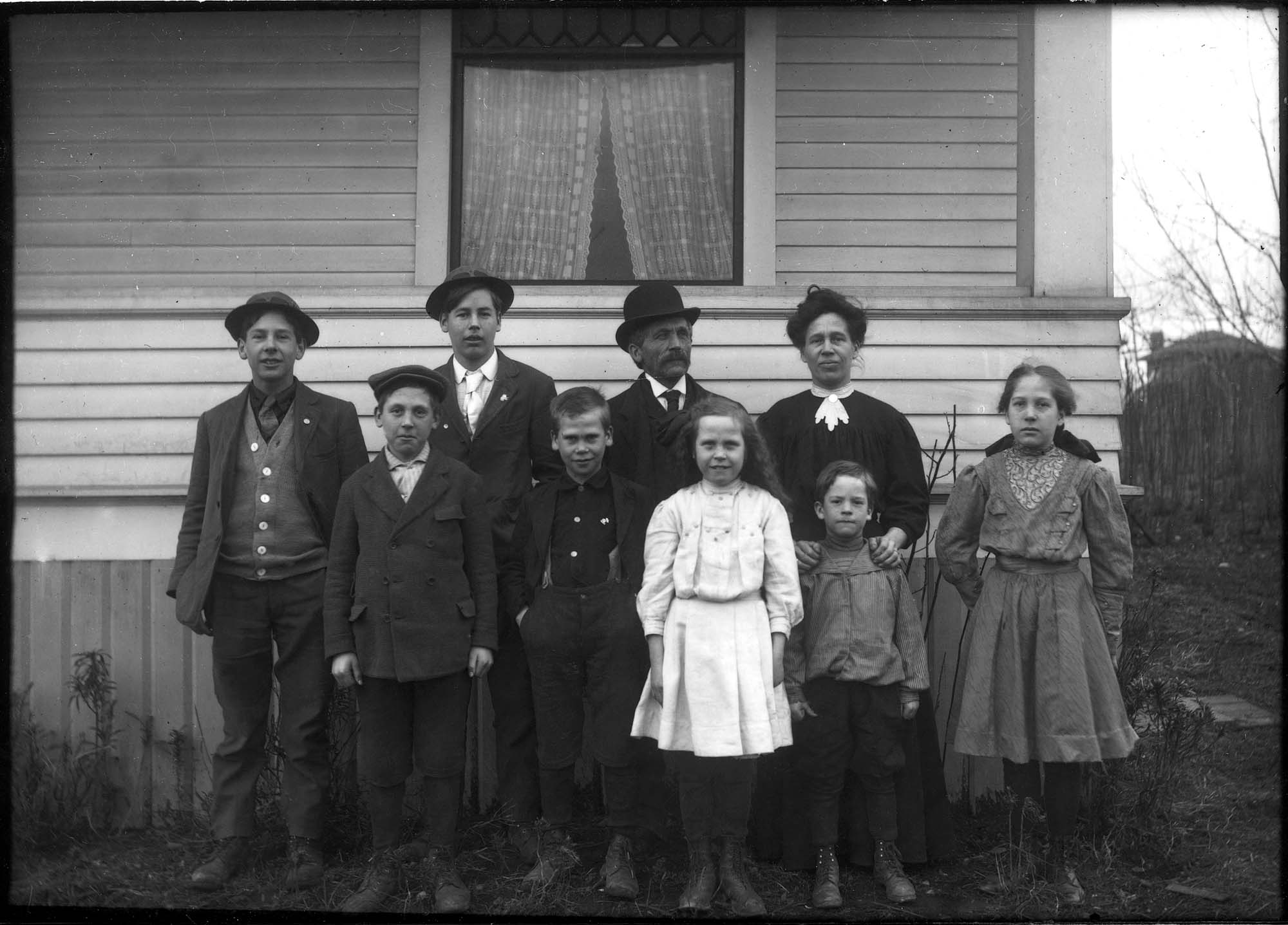 Image of Moen family outside their house, Seattle, circa 1910