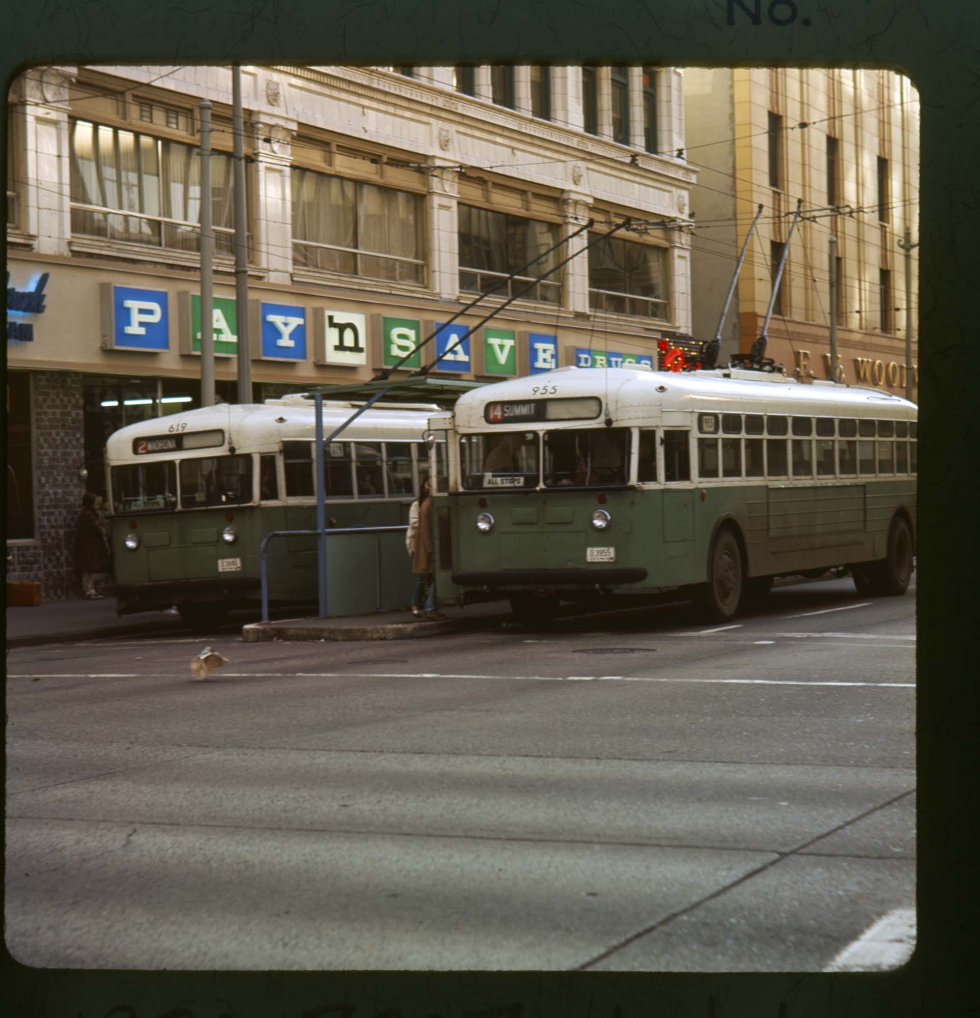 Image of Buses in front of Pay 'n Save and Woolworth's, on Fourth Avenue, Seattle, 1967