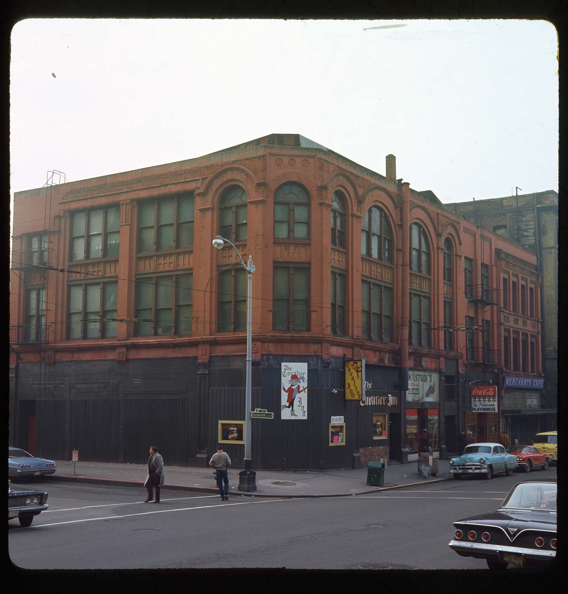 Image of Businesses on Yesler Way near Occidental Ave S., 1967