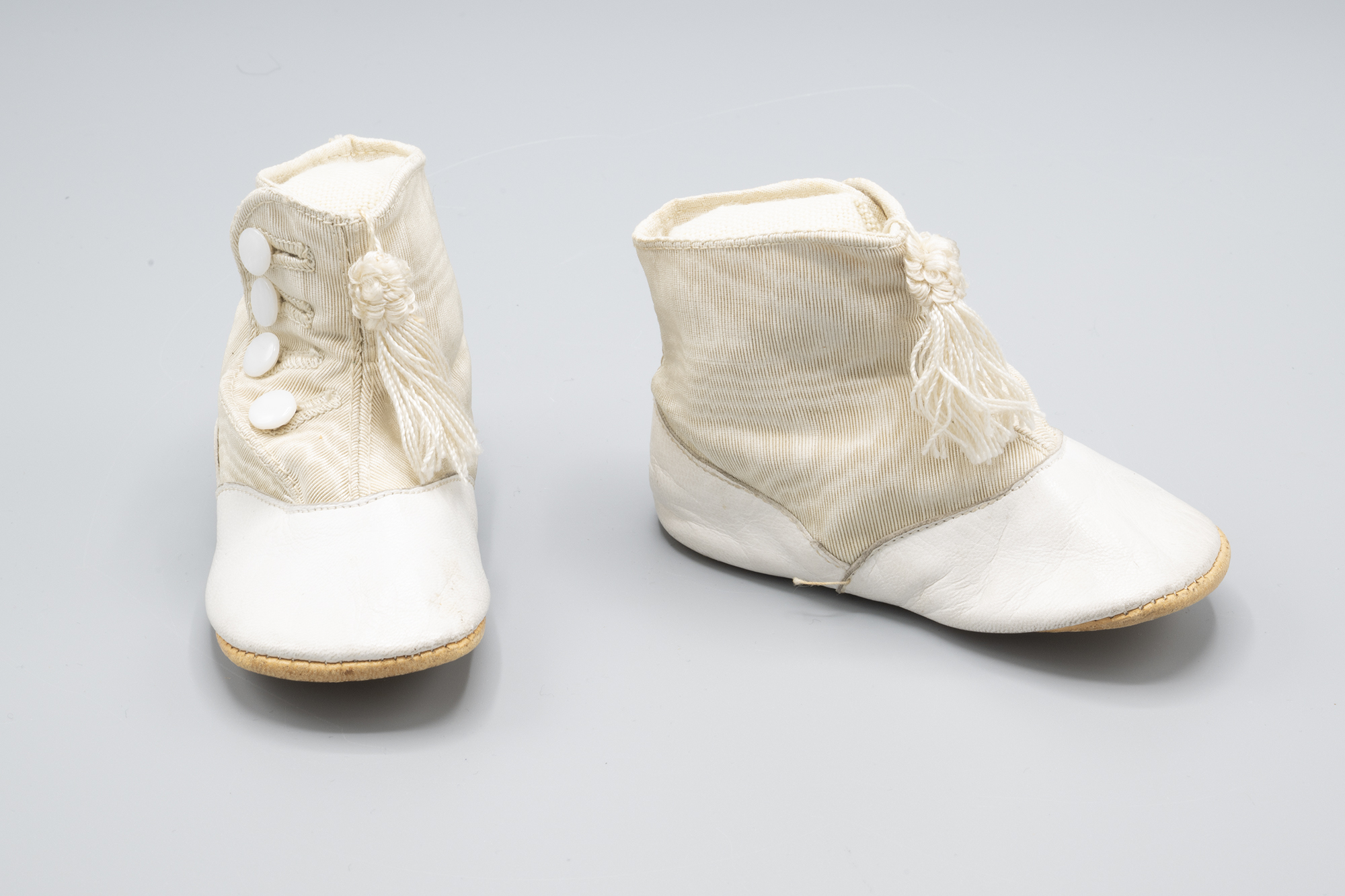 Image of Baby's leather bootees, sold at Nordstrom, ca. 1900