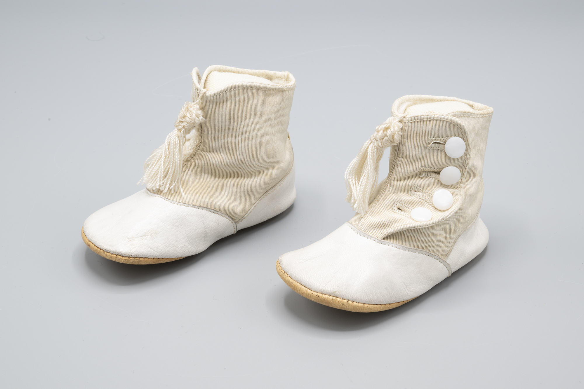 Image of Baby's leather bootees, sold at Nordstrom, ca. 1900