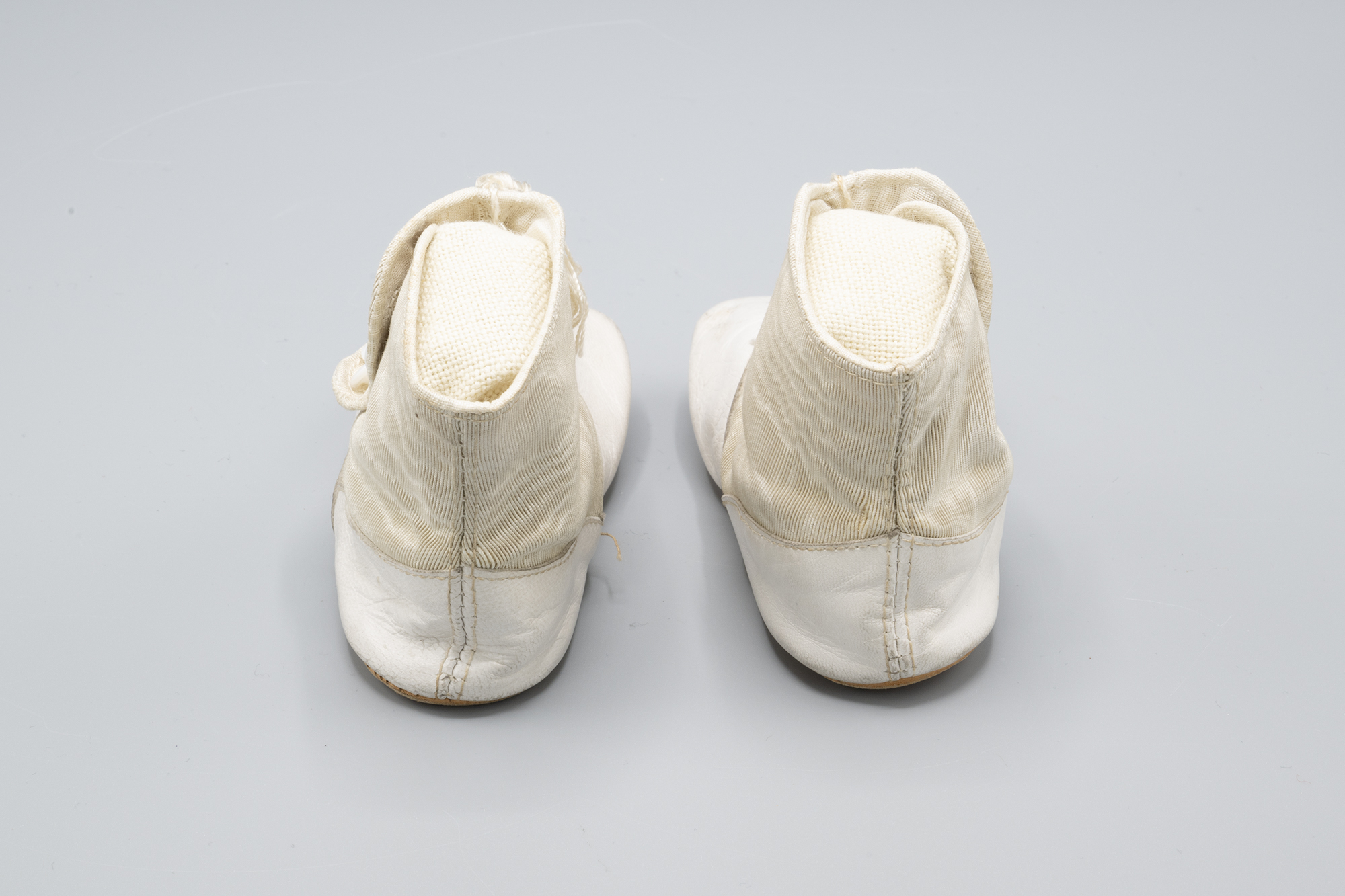 Image of Baby's leather bootees, sold at Nordstrom, ca. 1900