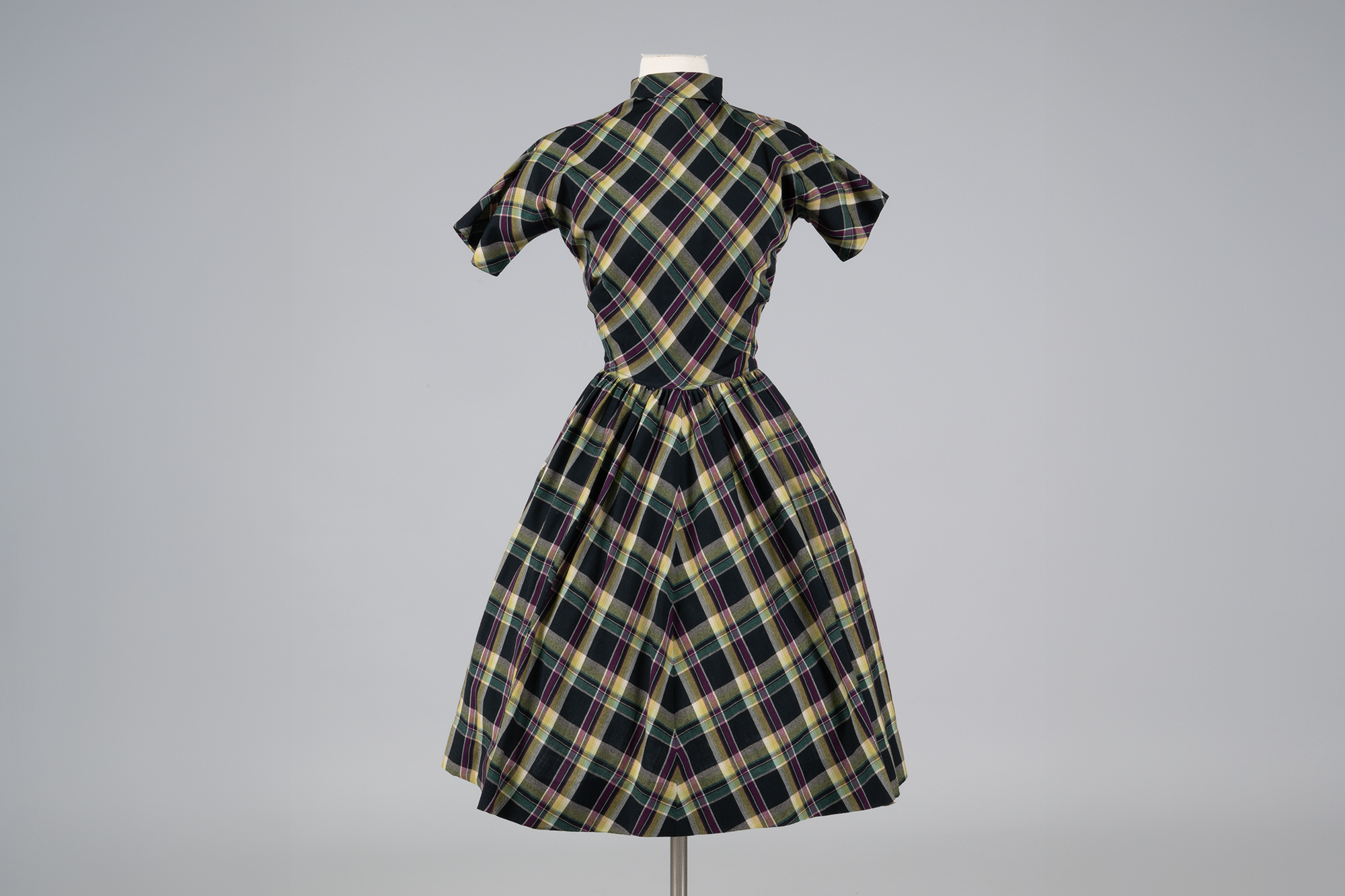 Image of Plaid dress designed by Claire McCardell and sold at Best's Apparel, 1950