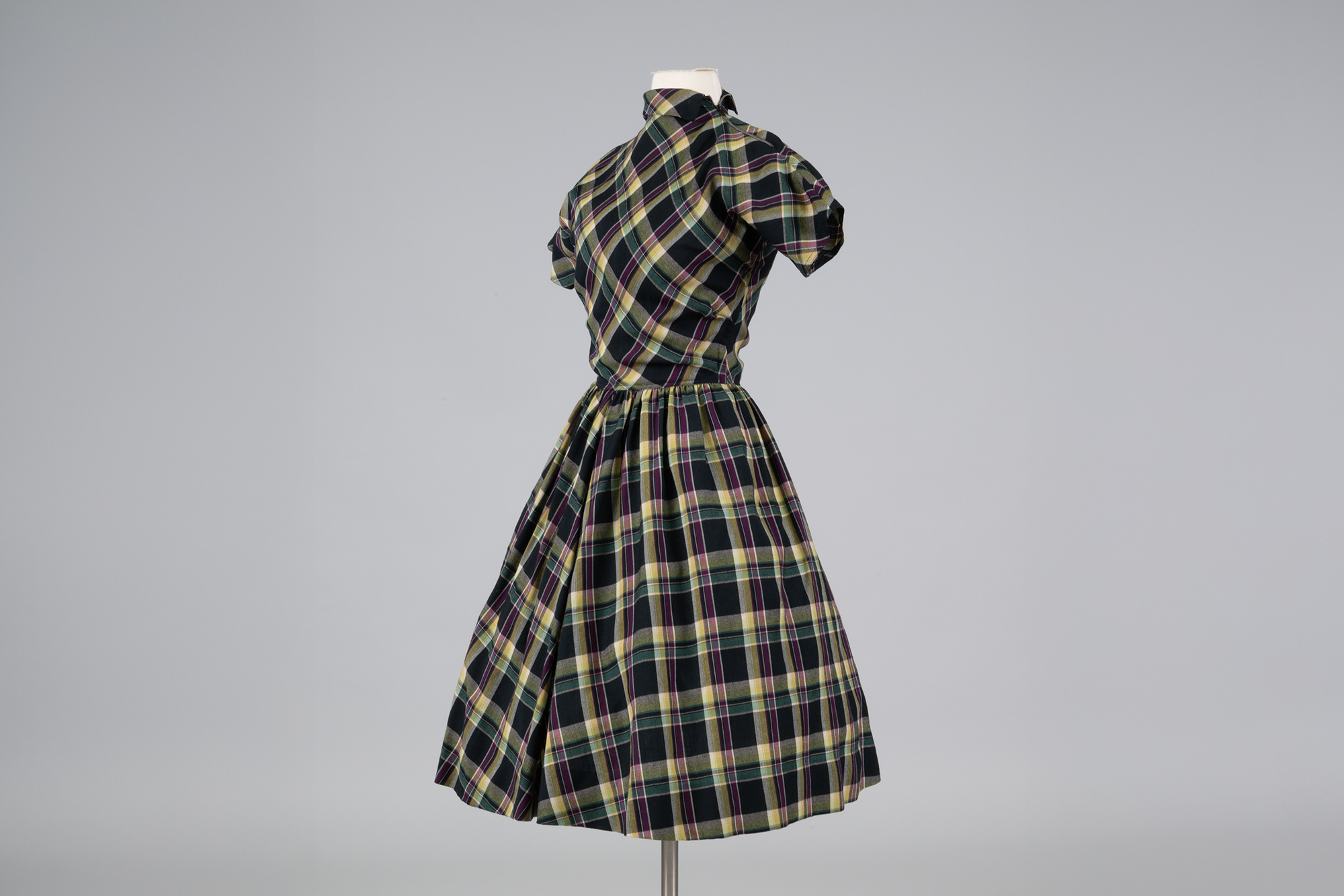 Image of Plaid dress designed by Claire McCardell and sold at Best's Apparel, 1950