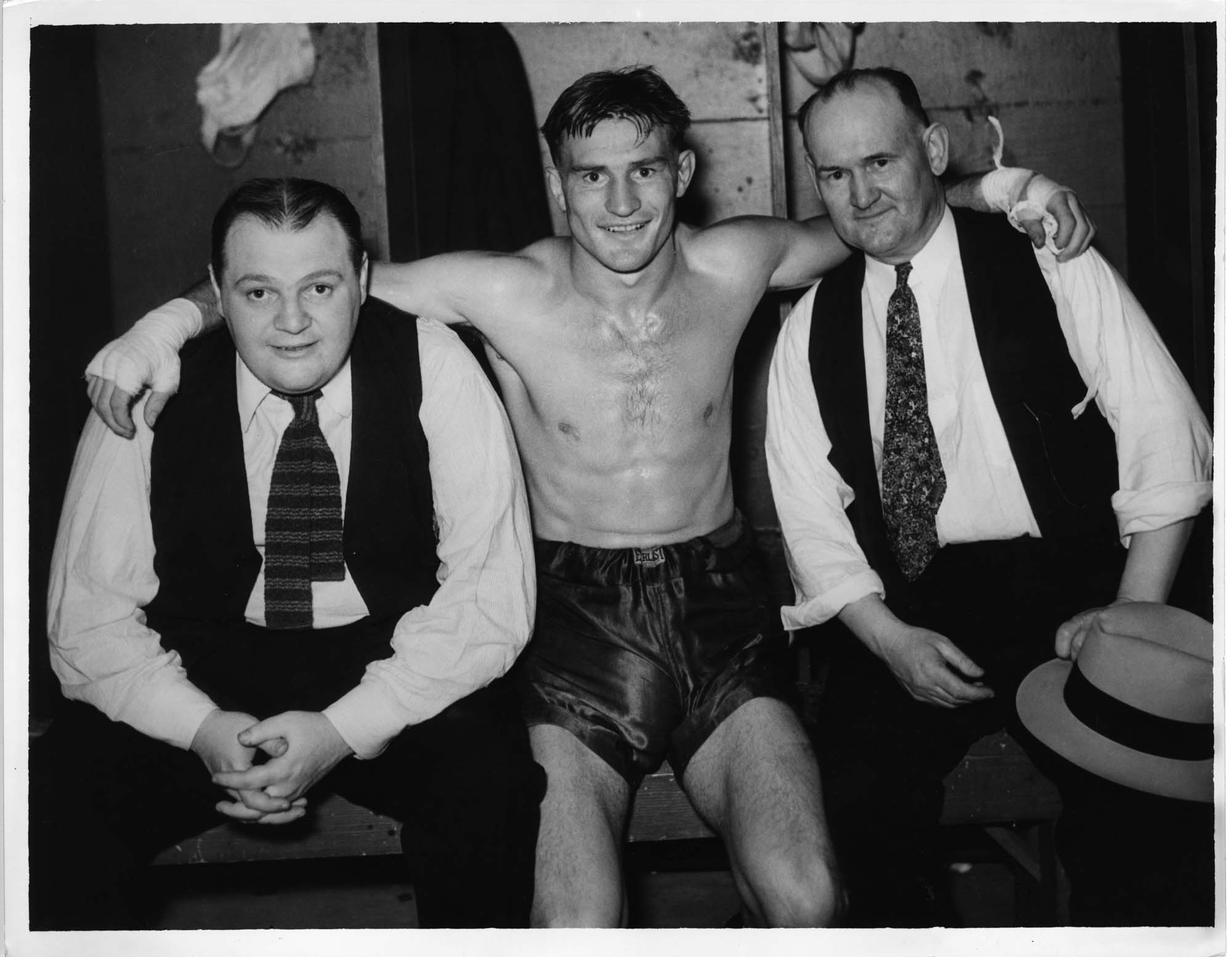 Image of Boxer Freddie Steele with manager Dave Miller and trainer Jack Connors, circa 1930