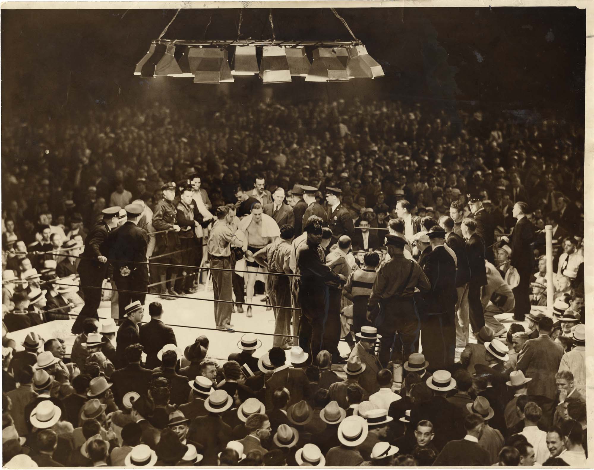 Image of Boxer Freddie Steele and others in ring at the Civic Stadium, Seattle, July 26, 1938