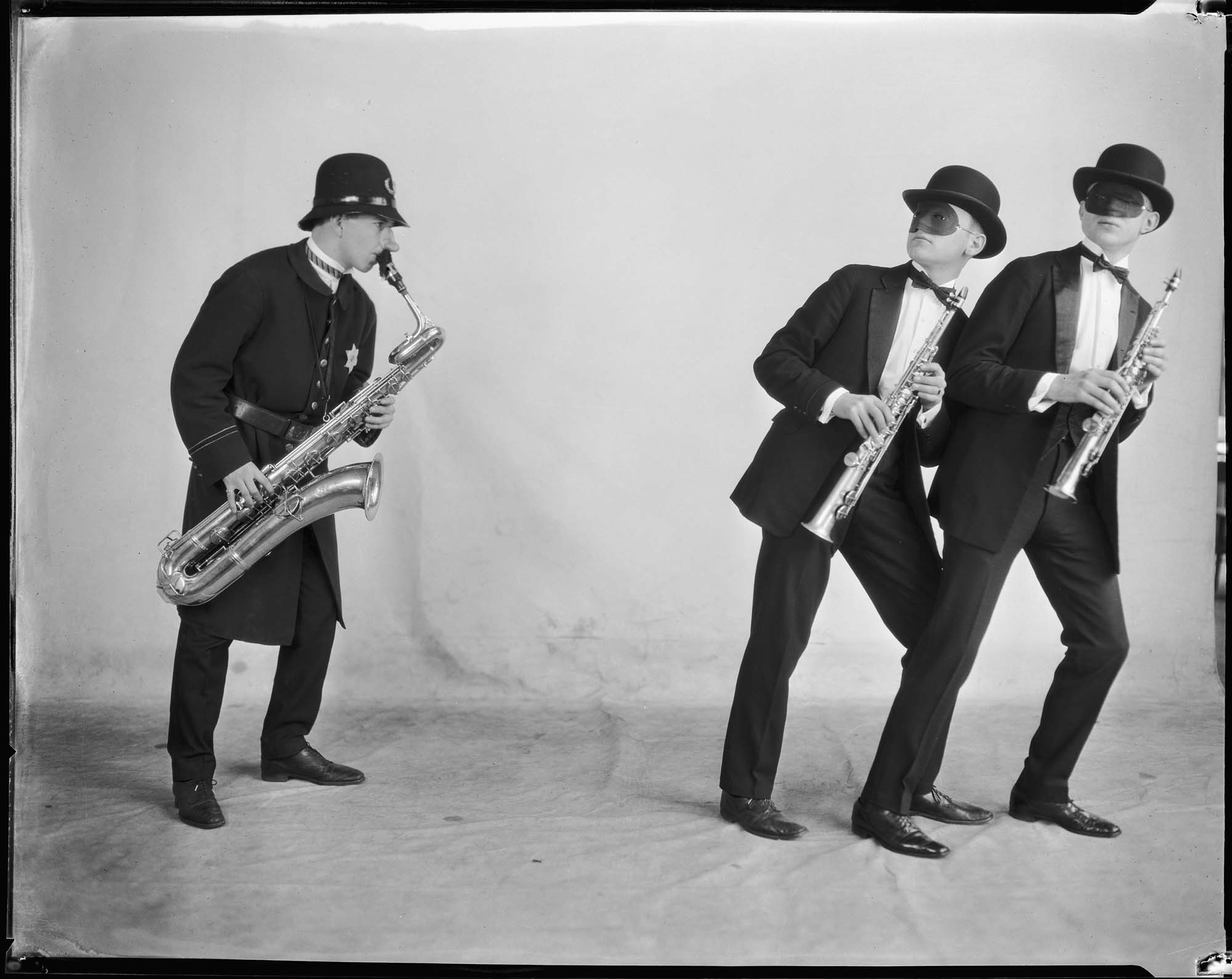 Image of University of Washington Saxophone Trio in a skit, circa 1922