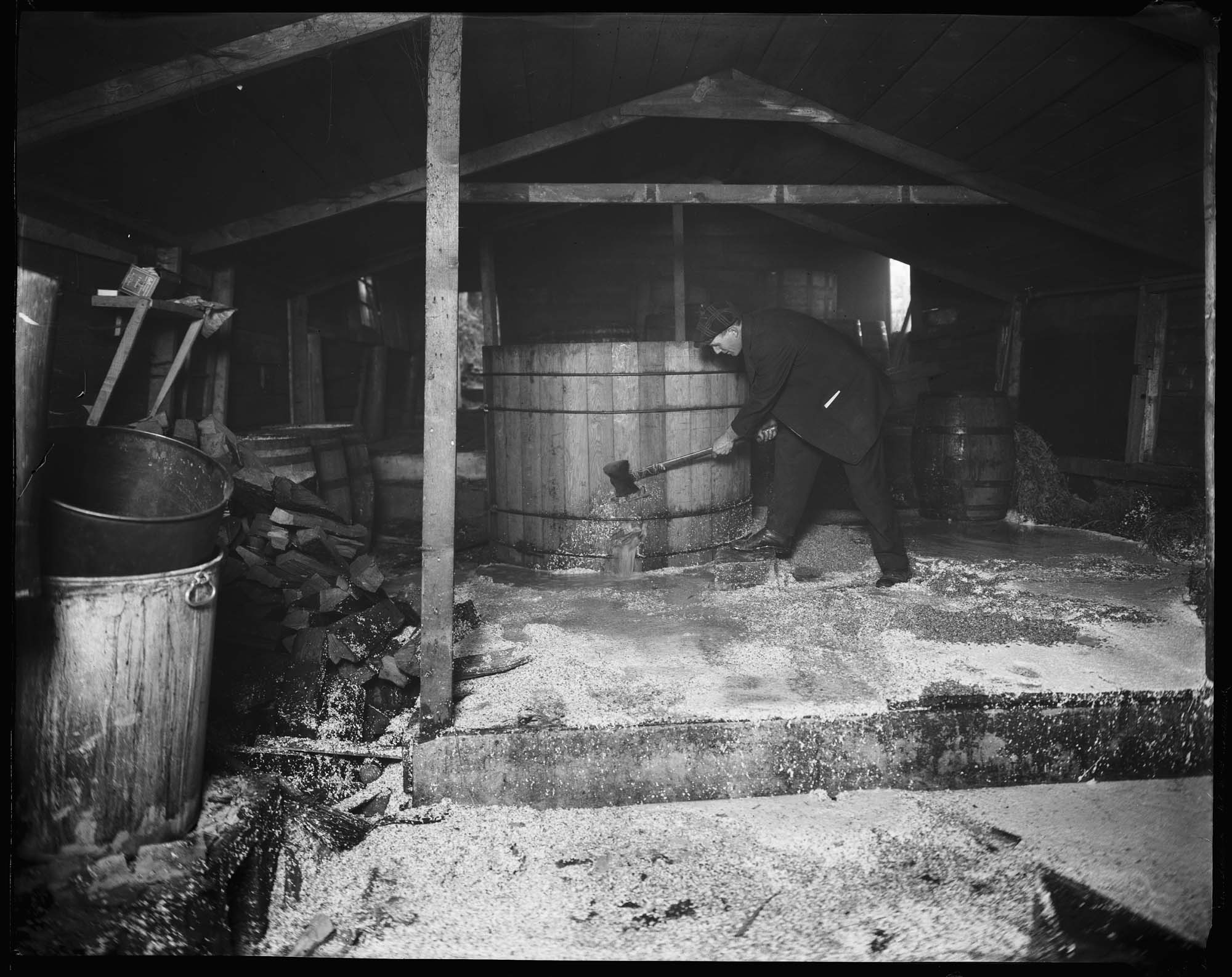 Image of Destruction of an illegal Japanese distillery on 65th Avenue , circa 1918