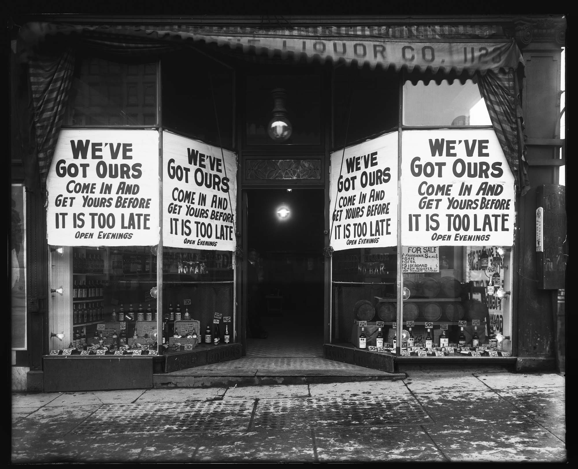 Image of Keystone Liquor Company signs at start of Prohibition, Seattle, circa 1916
