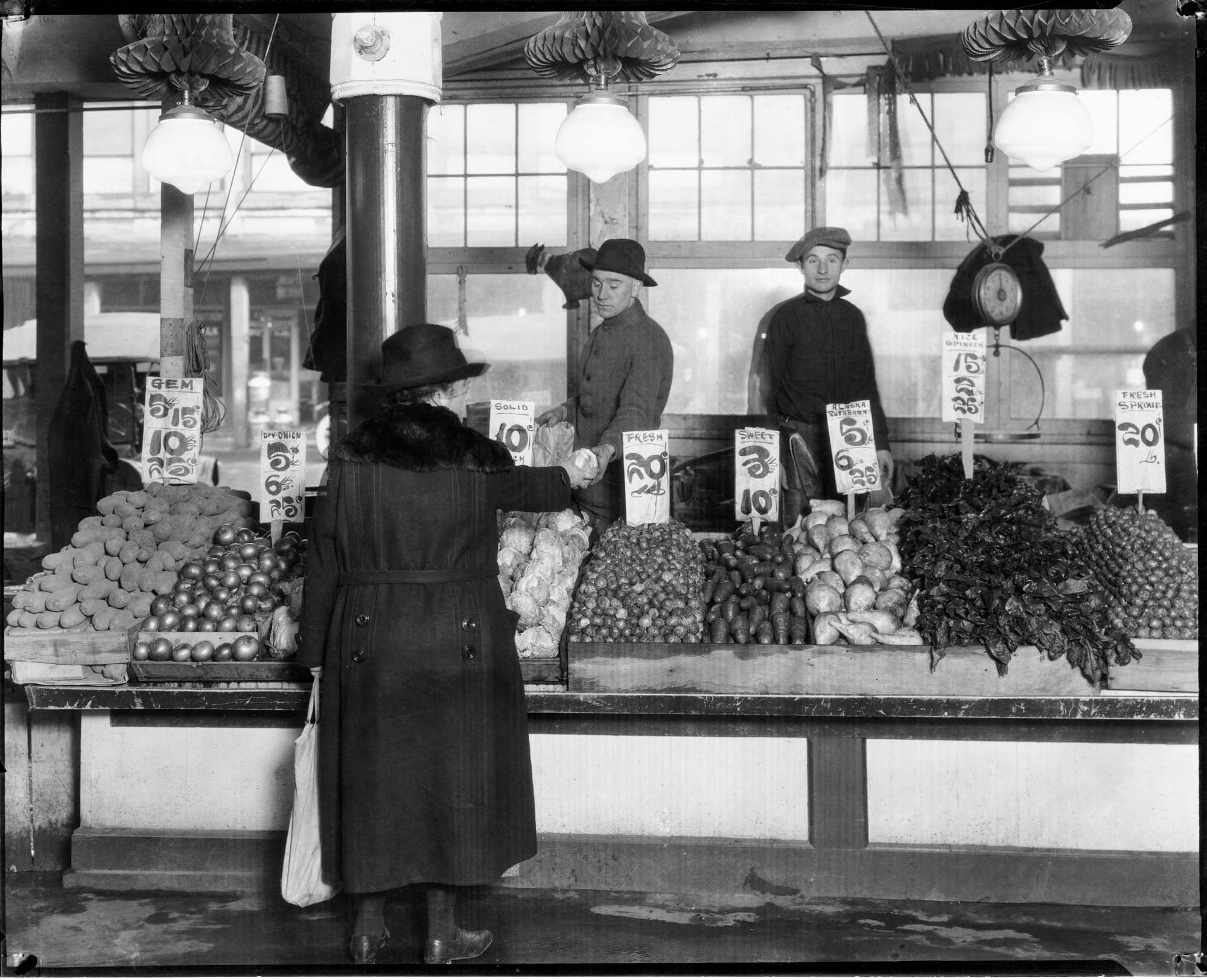 Image of Buying lettuce at the Pike Place Market, January 1924