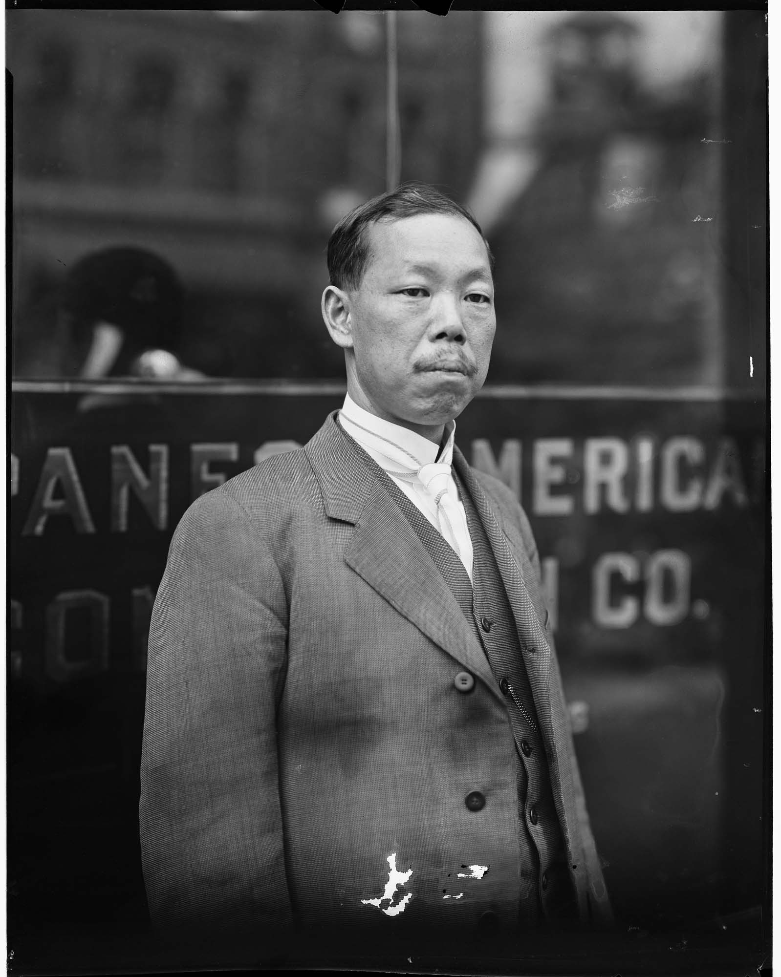 Image of Shozo Tsutakawa in front of Japanese American Commission Company, circa 1919