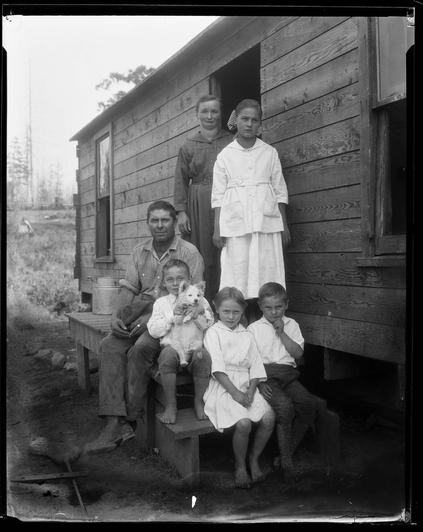 Image of The A.J. Sullivan family and their house, August 19, 1919