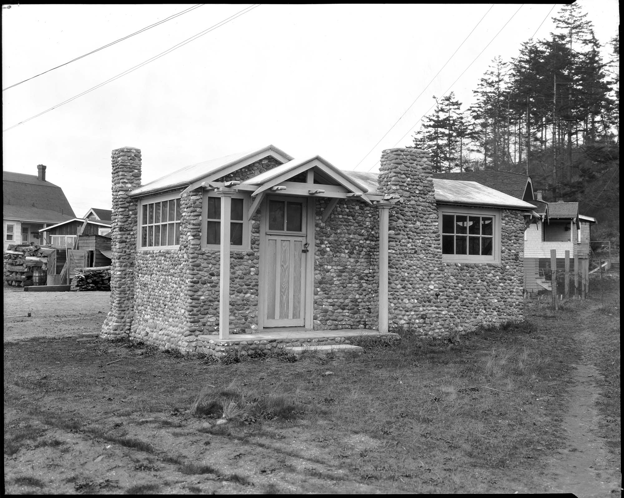 Image of Cobblestone miniature house at Alki, circa 1925