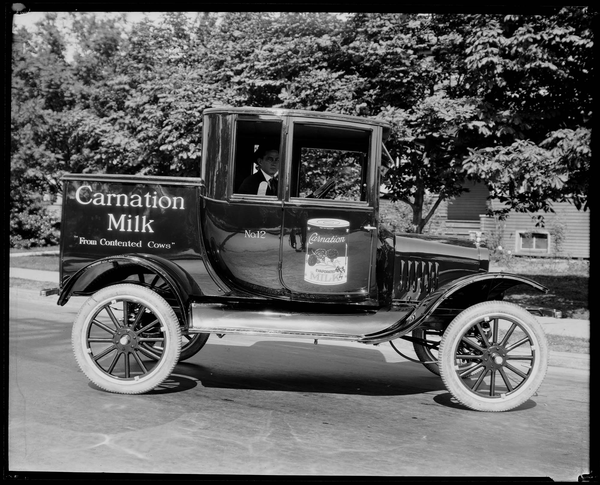 Image of Carnation Milk truck, circa 1921