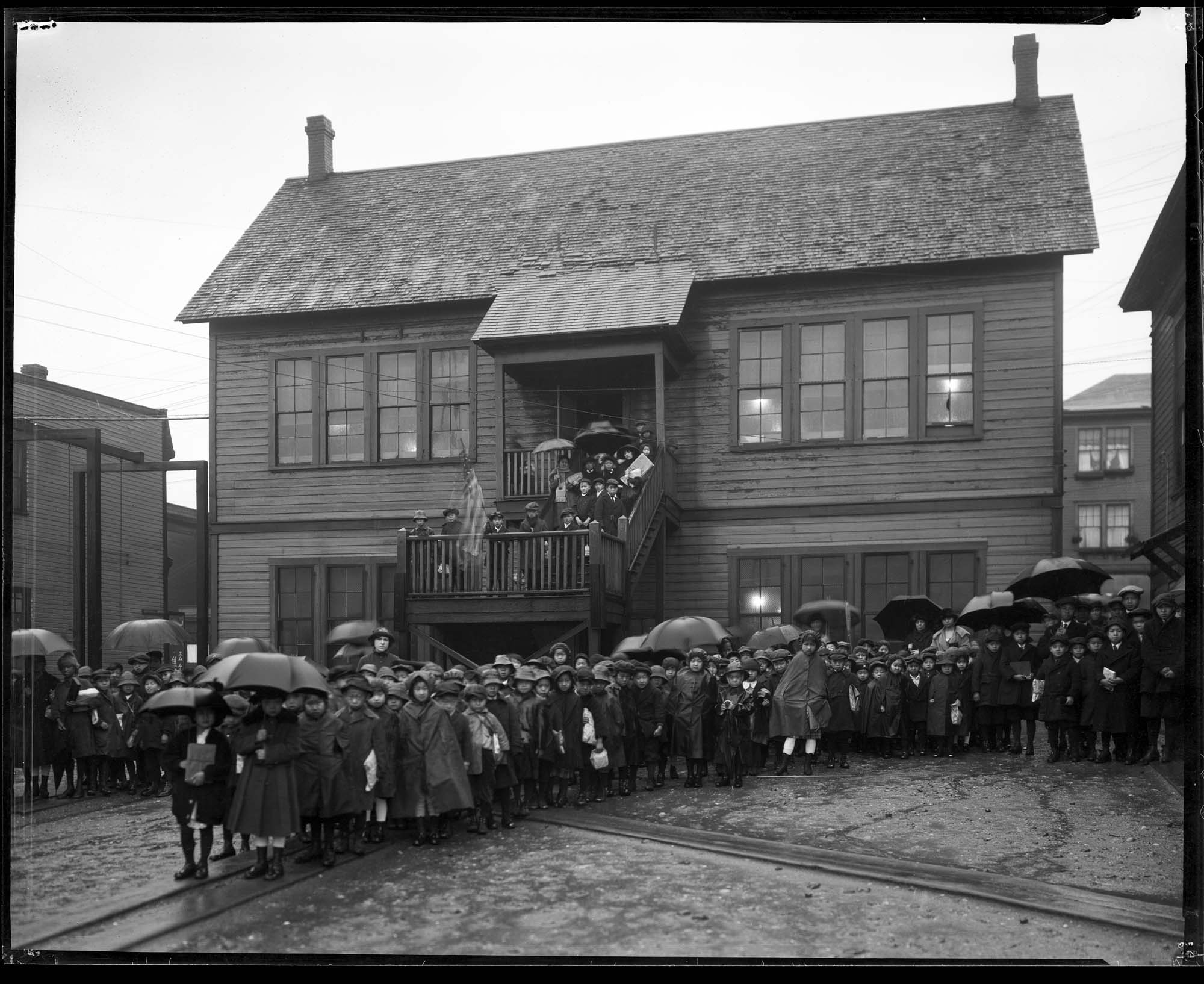 Image of School children leaving Main Street School, December 11, 1921