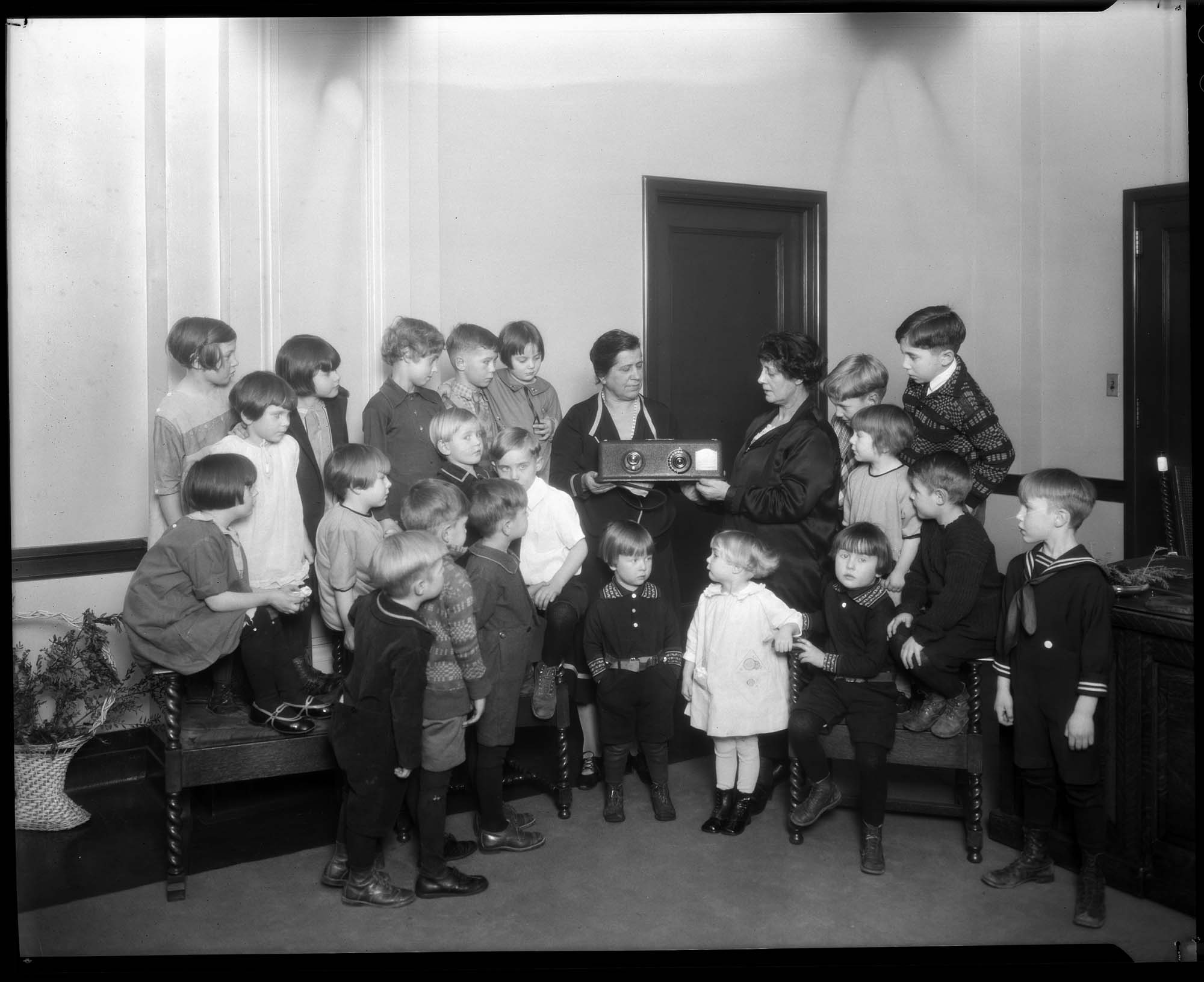 Image of Mayor Landes and children from The Theodora Home, circa 1927