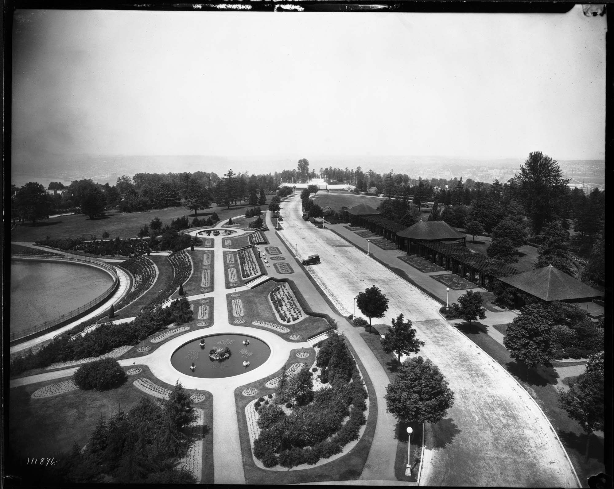 Image of Formal gardens, reservoir, and pavilion at Volunteer Park, circa 1914
