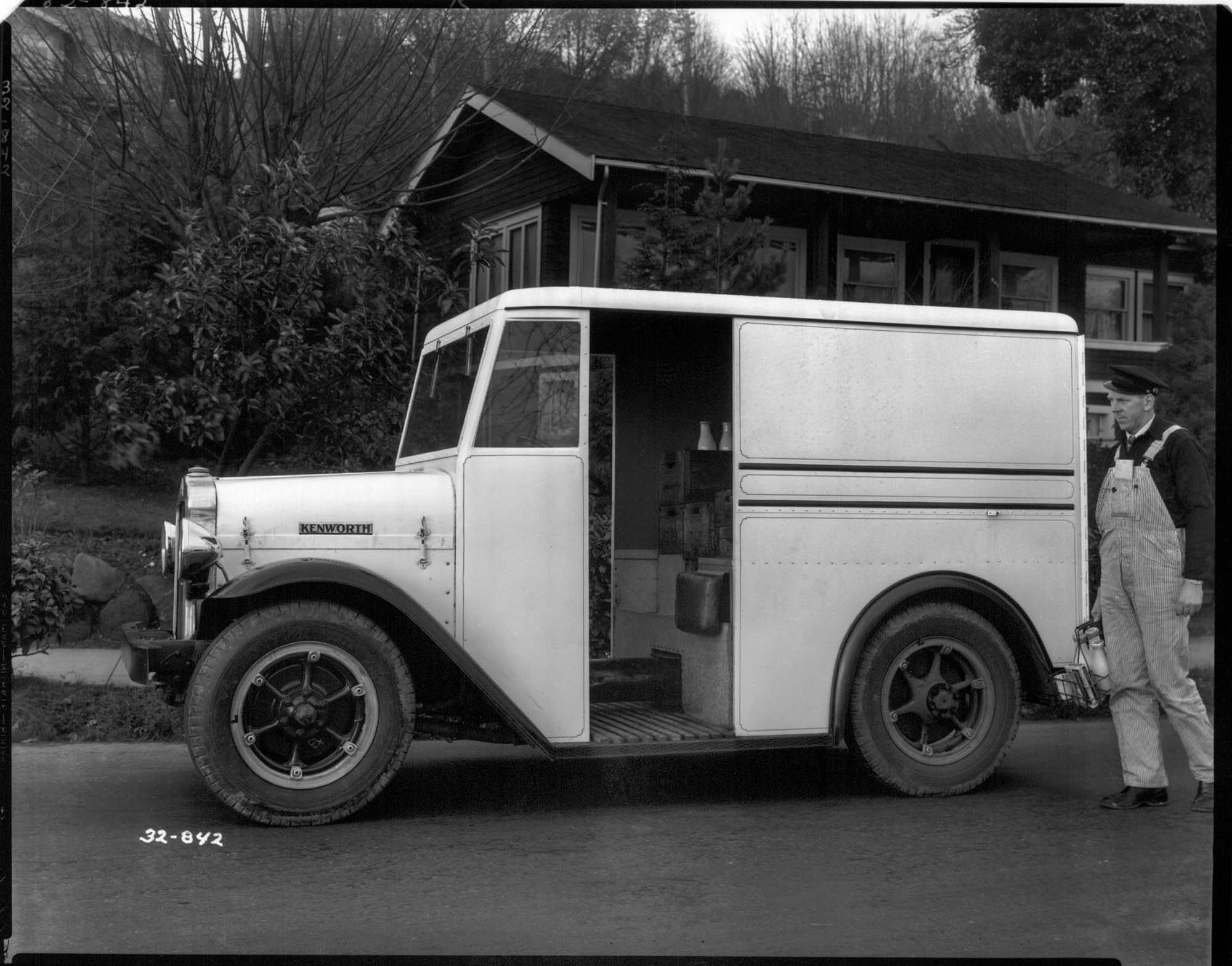 Image of Milkman with Kenworth delivery truck, probably in Seattle, 1932