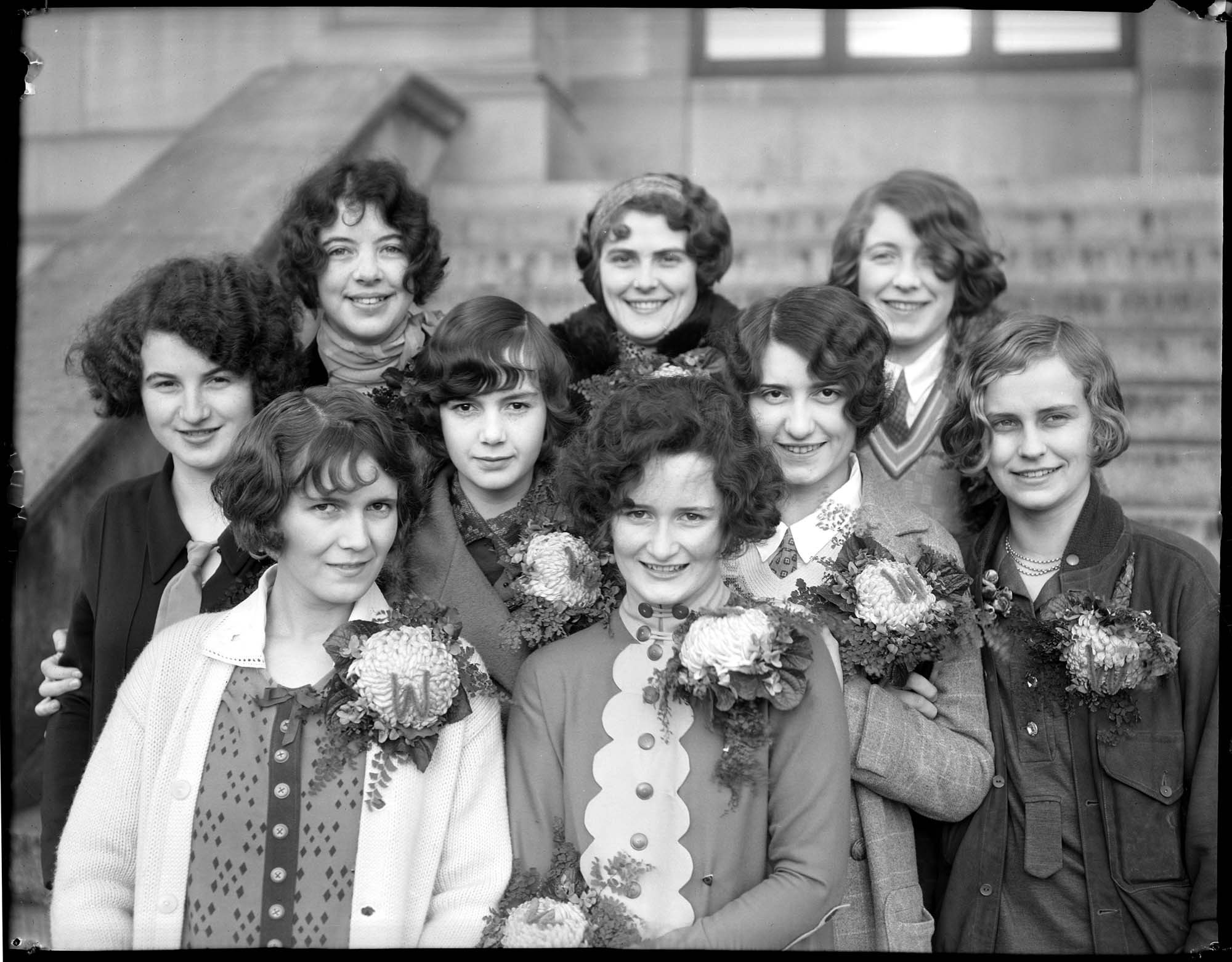 Image of Women students at the University of Washington wearing football corsages, circa 1925