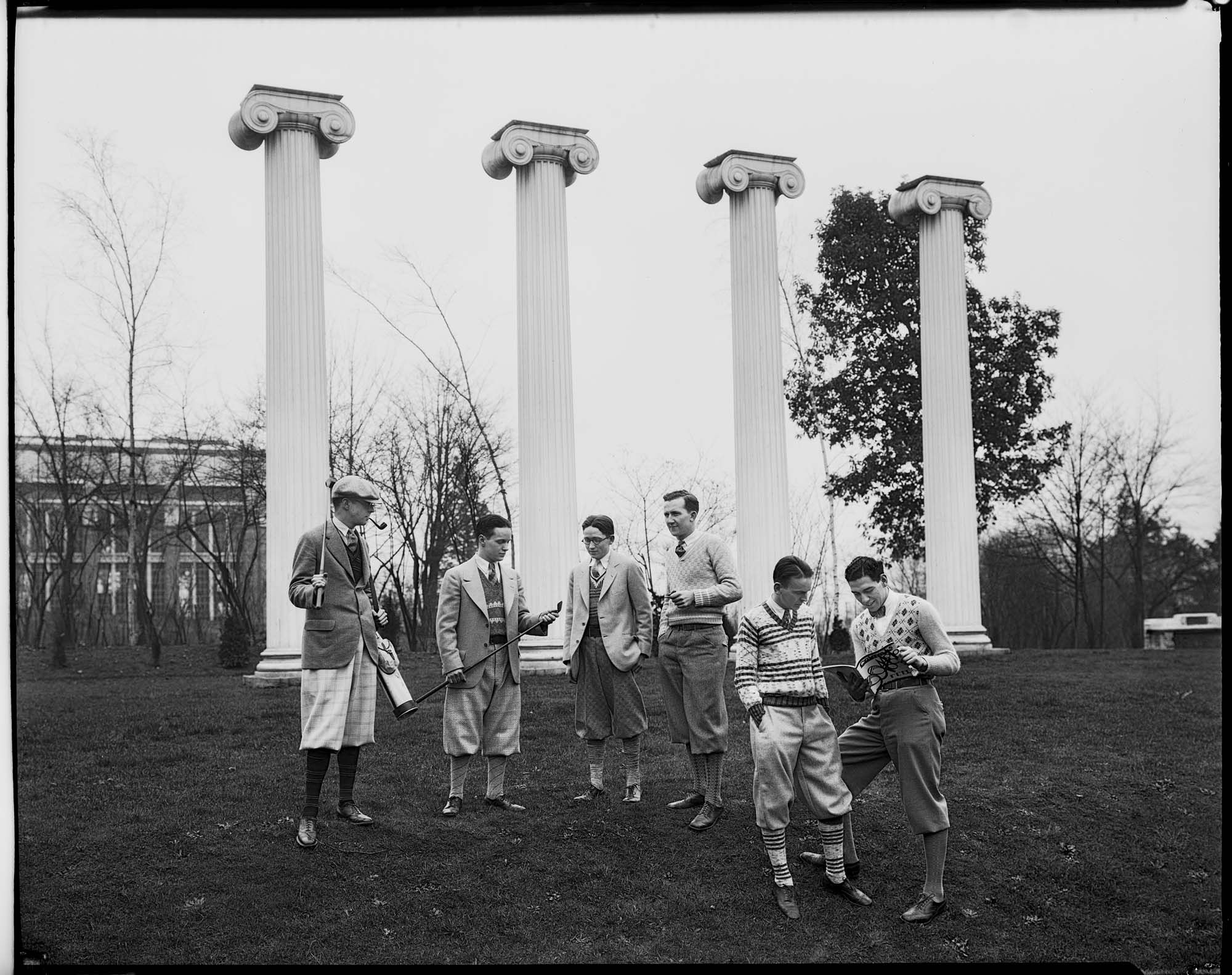 Image of Students in front of columns on University of Washington campus, Seattle, circa 1925