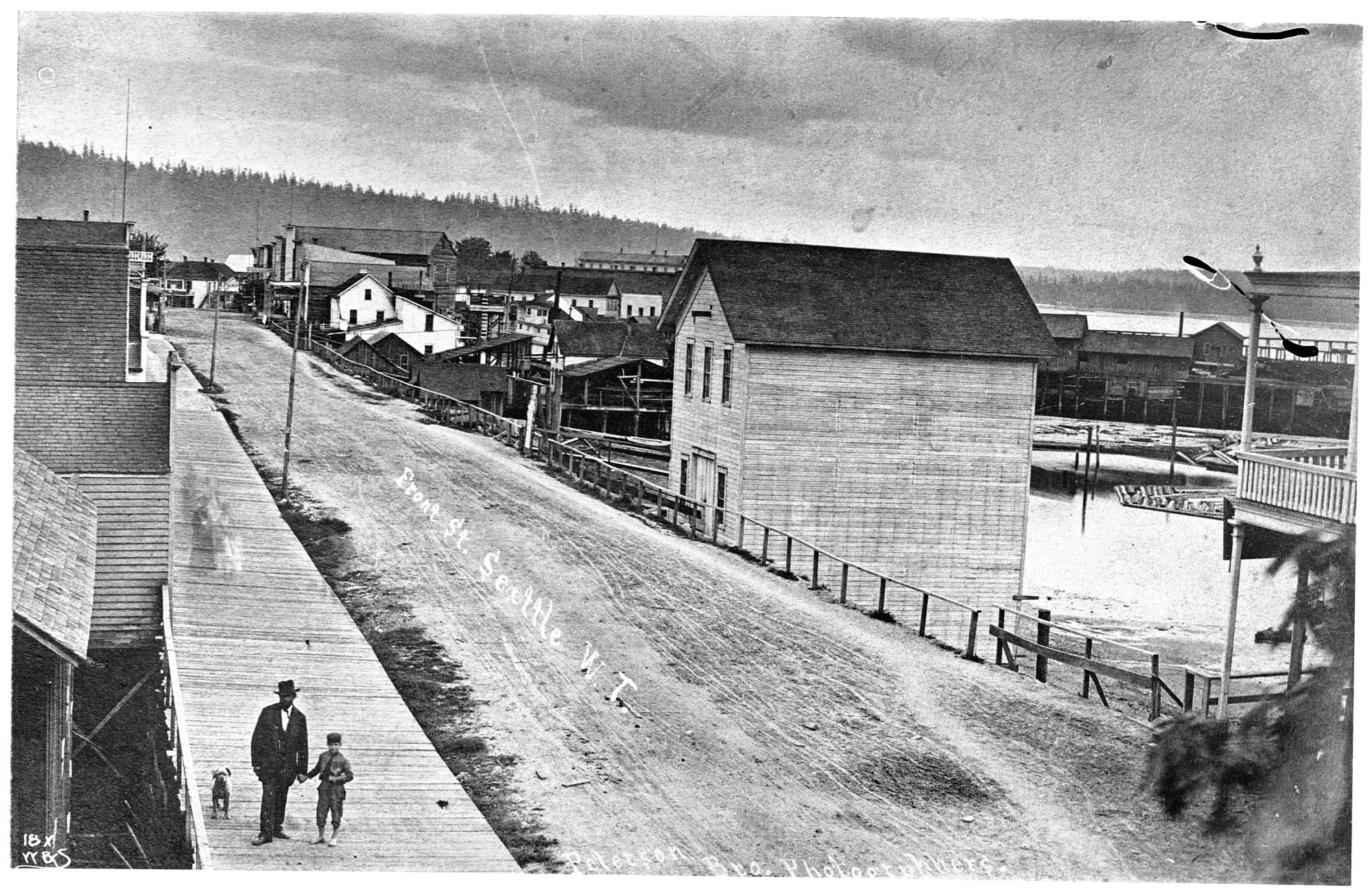 Image of Wooden sidewalk on Front Street, circa 1878