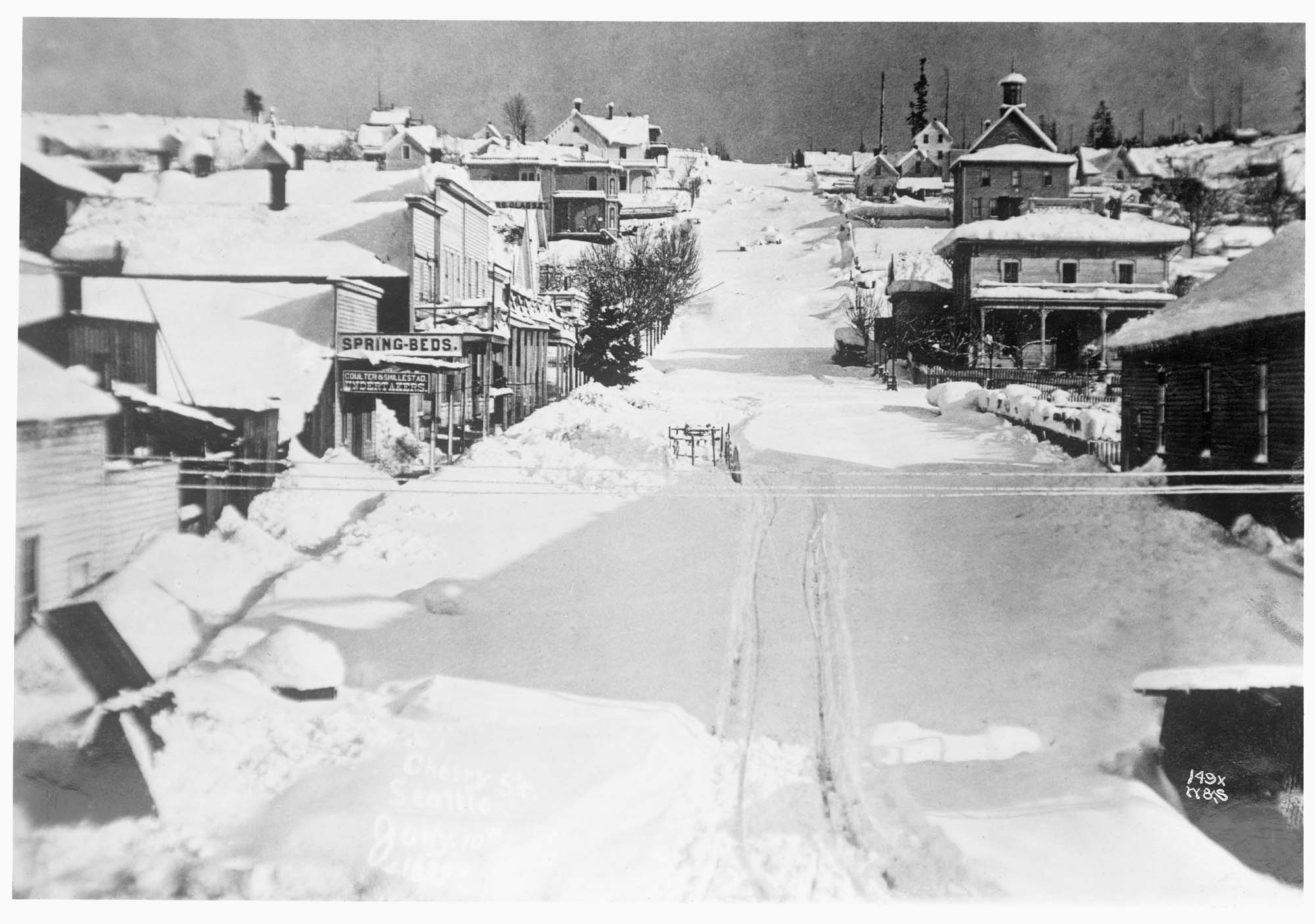 Image of Cherry Street in over five feet of snow, 1880