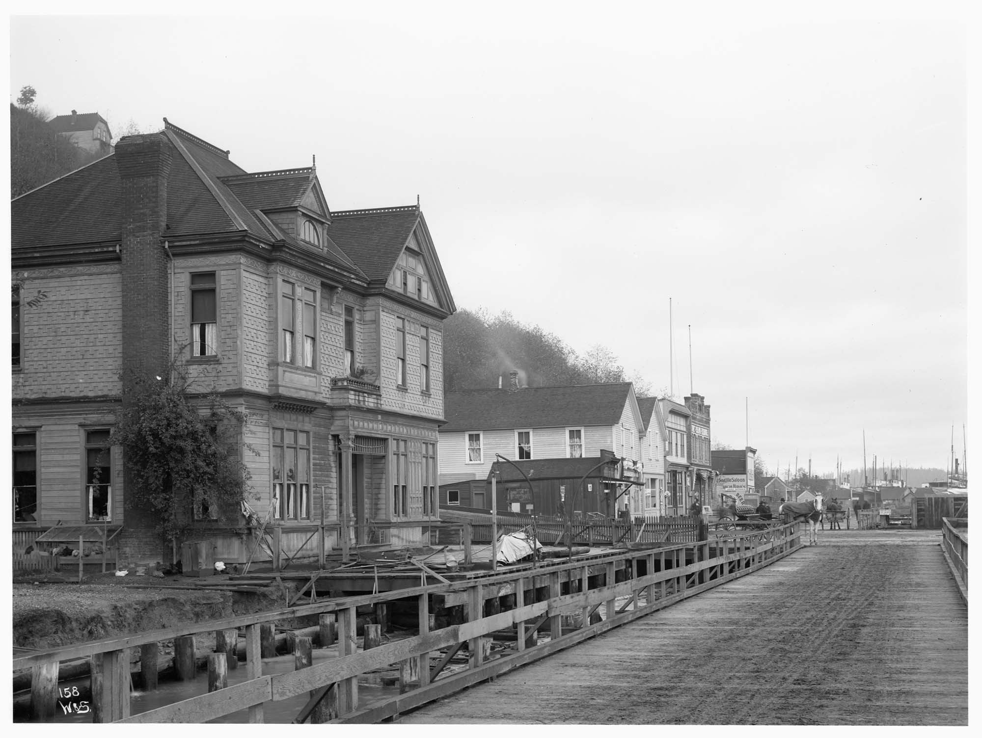 Image of West Seattle business district, circa 1904