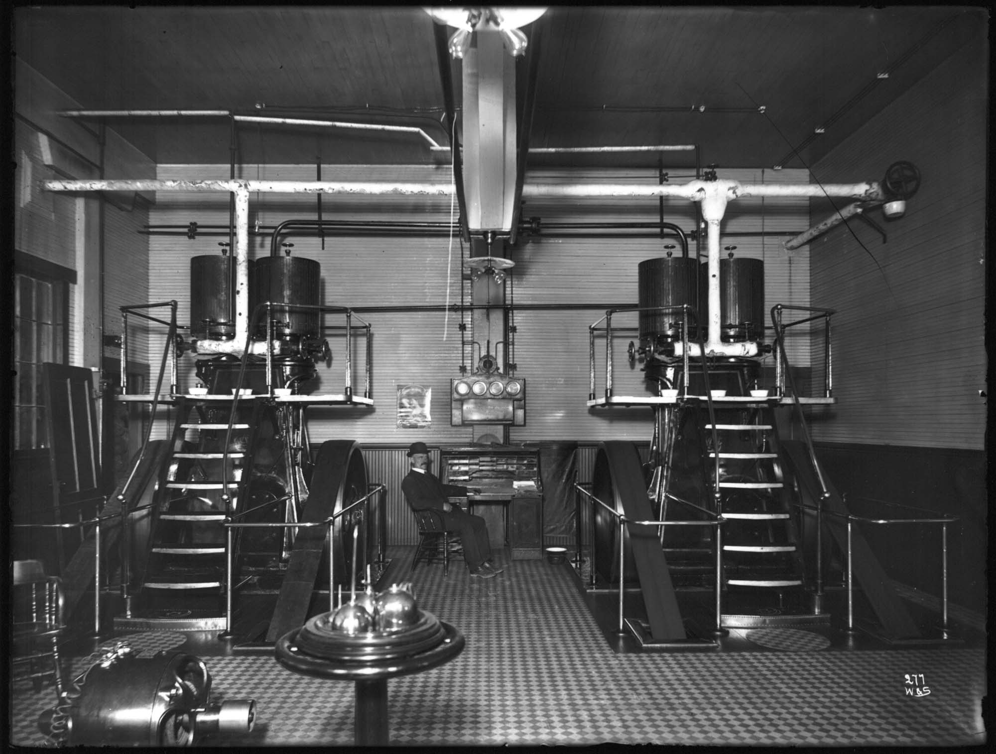 Image of Man inside Oriental Dock warehouse, Seattle, 1911