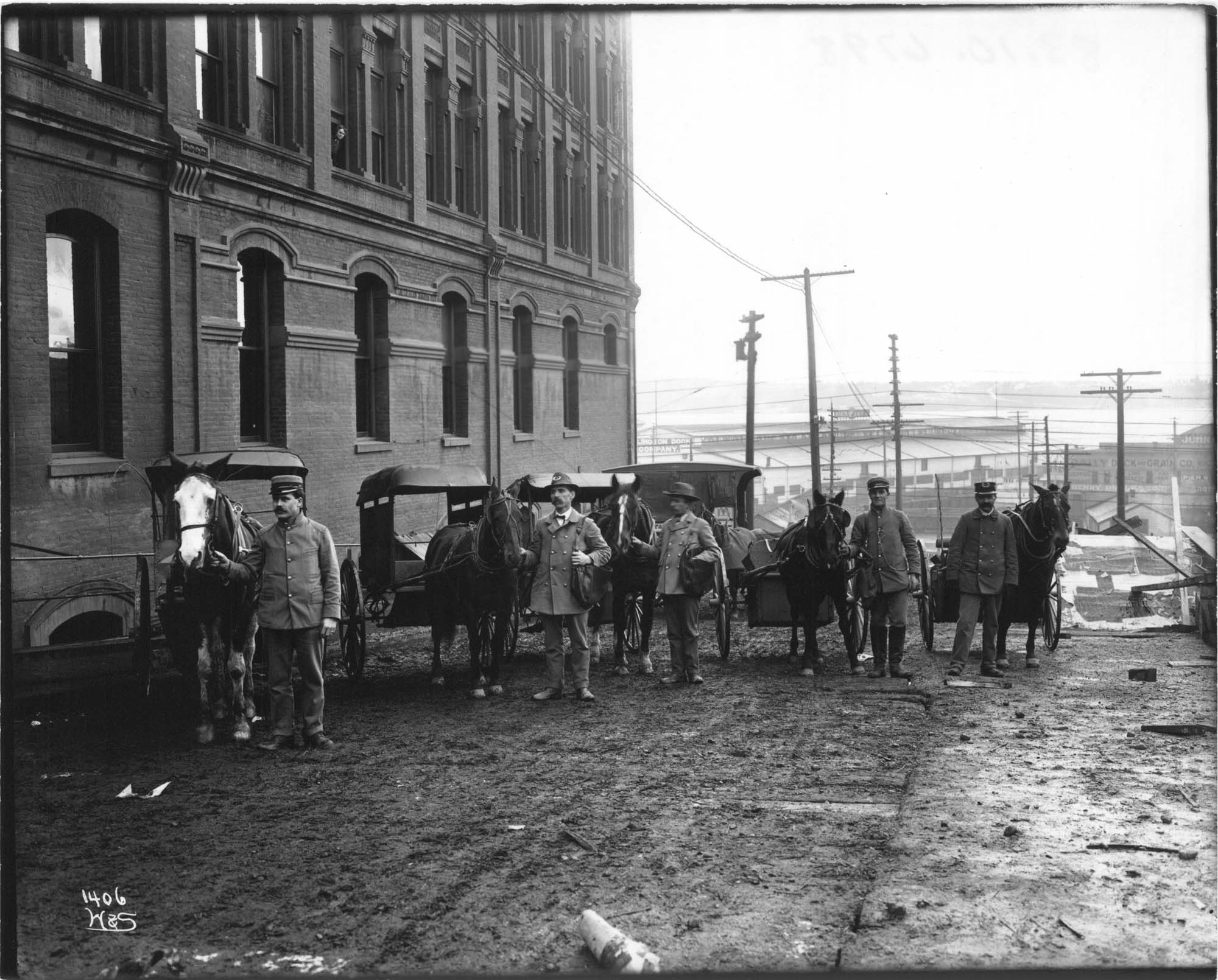 Image of Postal employees and wagons, Seattle, circa 1911