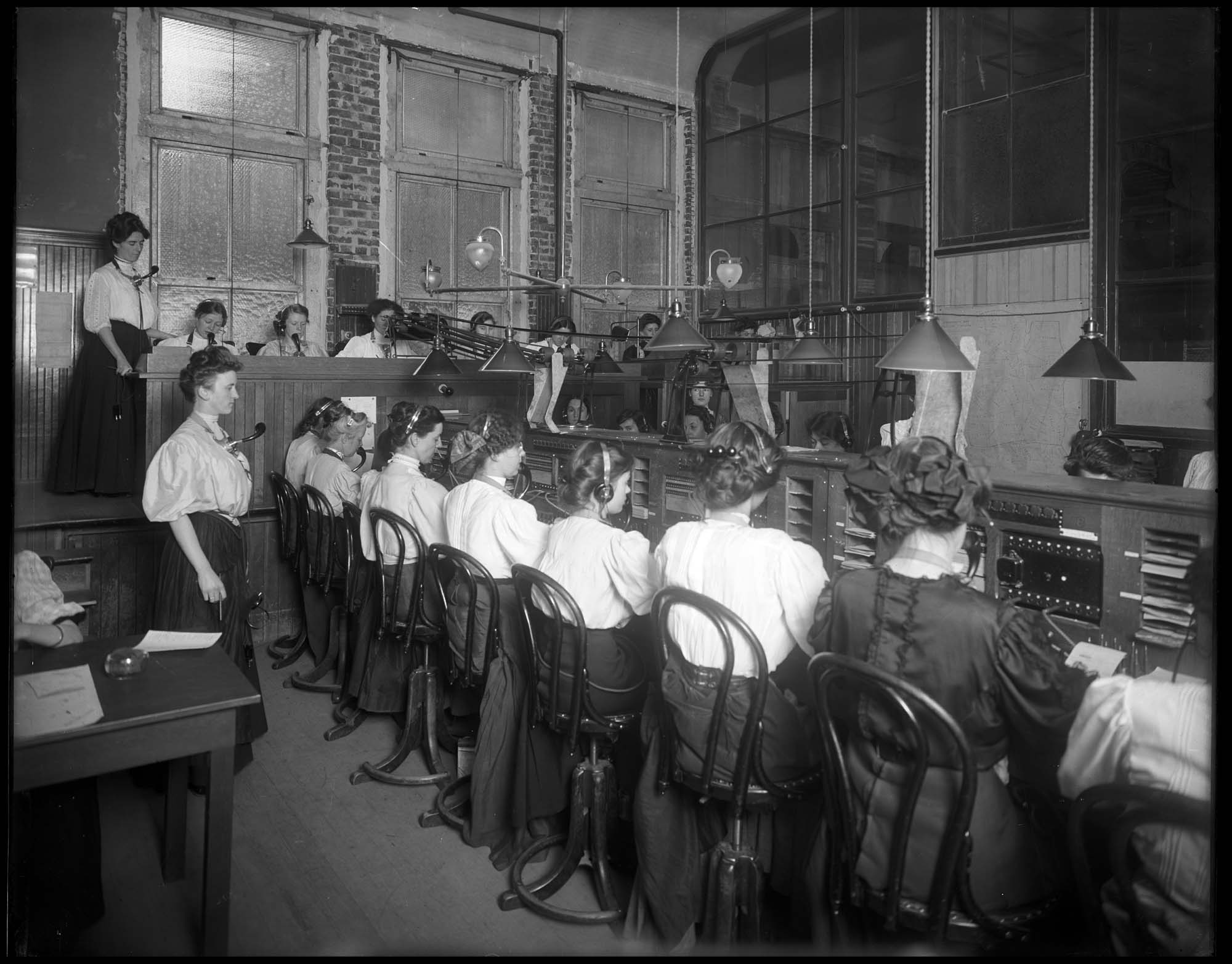 Image of Long-distance operators at the Sunset Telephone Company, Seattle, circa 1905