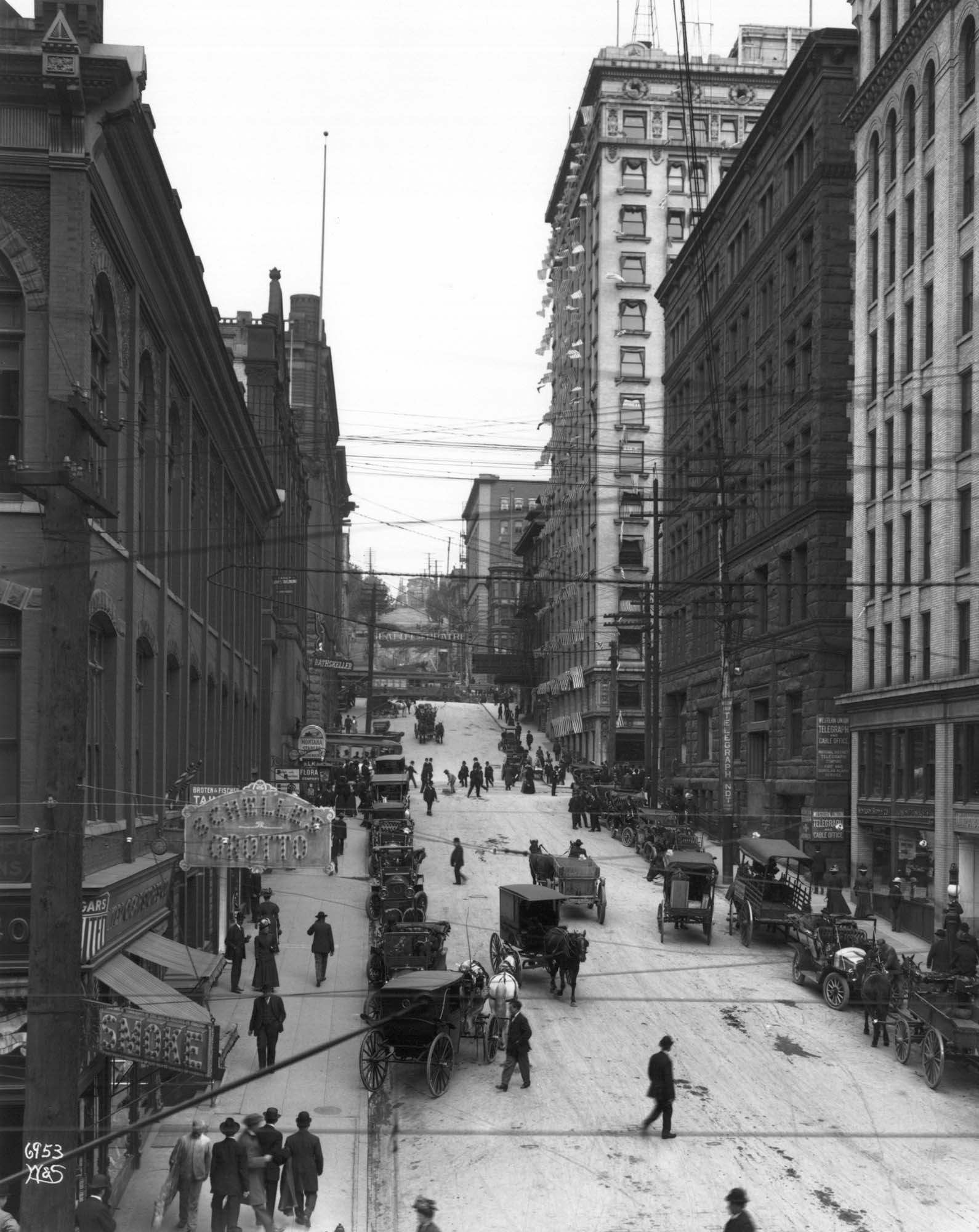 Image of Cherry Street looking east from First Avenue, Seattle, circa 1907