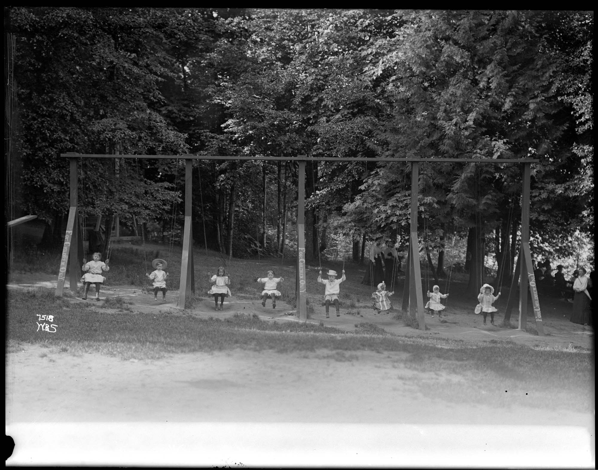 Image of Woodland Park swings, circa 1912