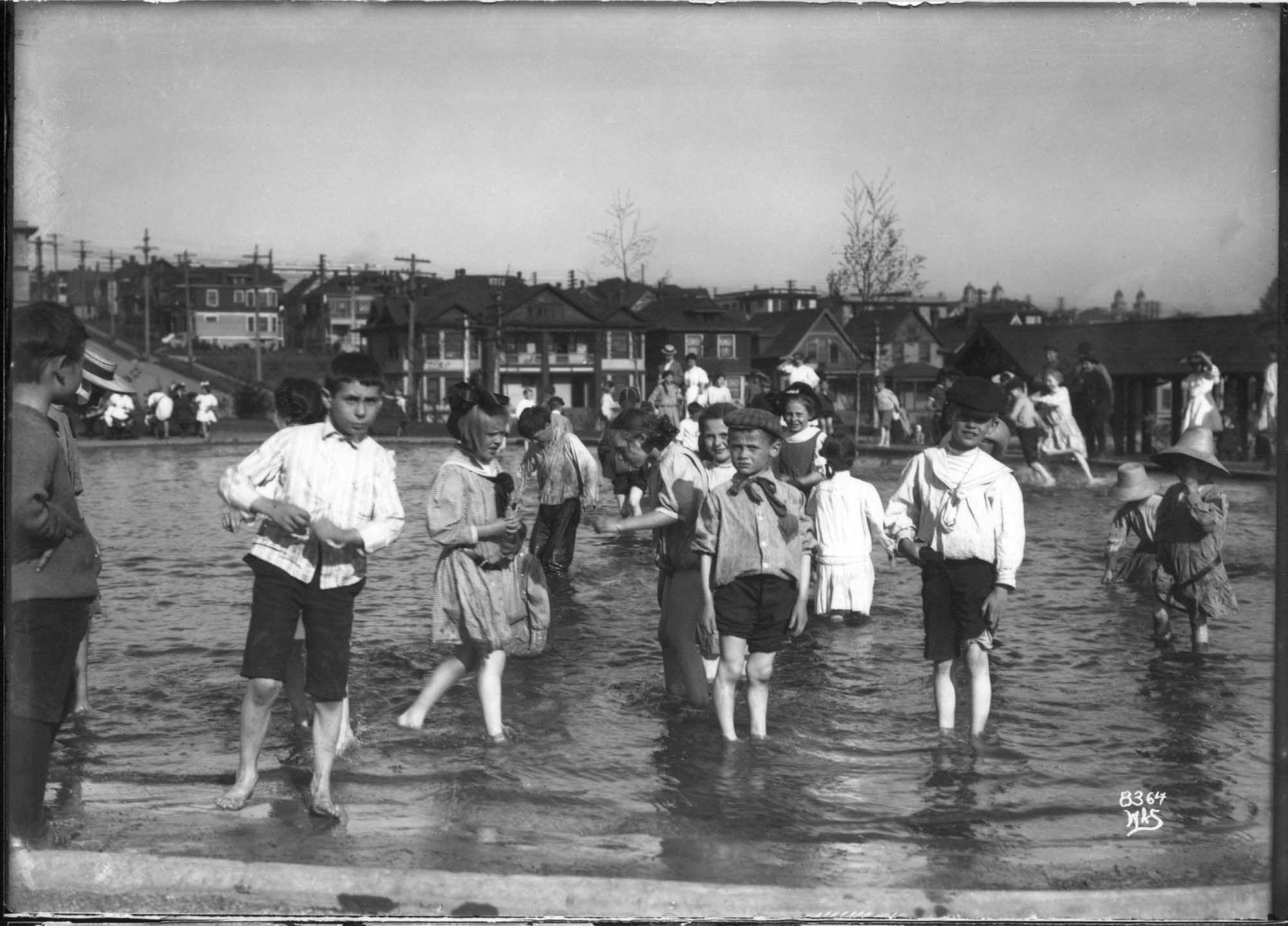 Image of Children in wading pool at Lincoln Park, Seattle, circa 1911