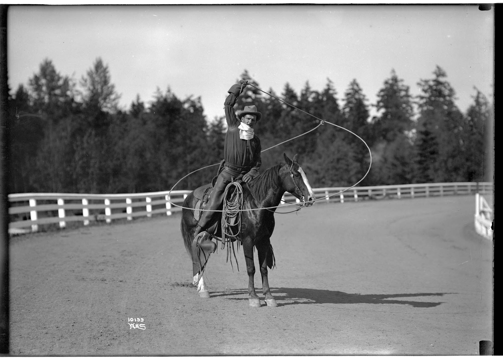 Image of Cowboy doing rope tricks, 1909