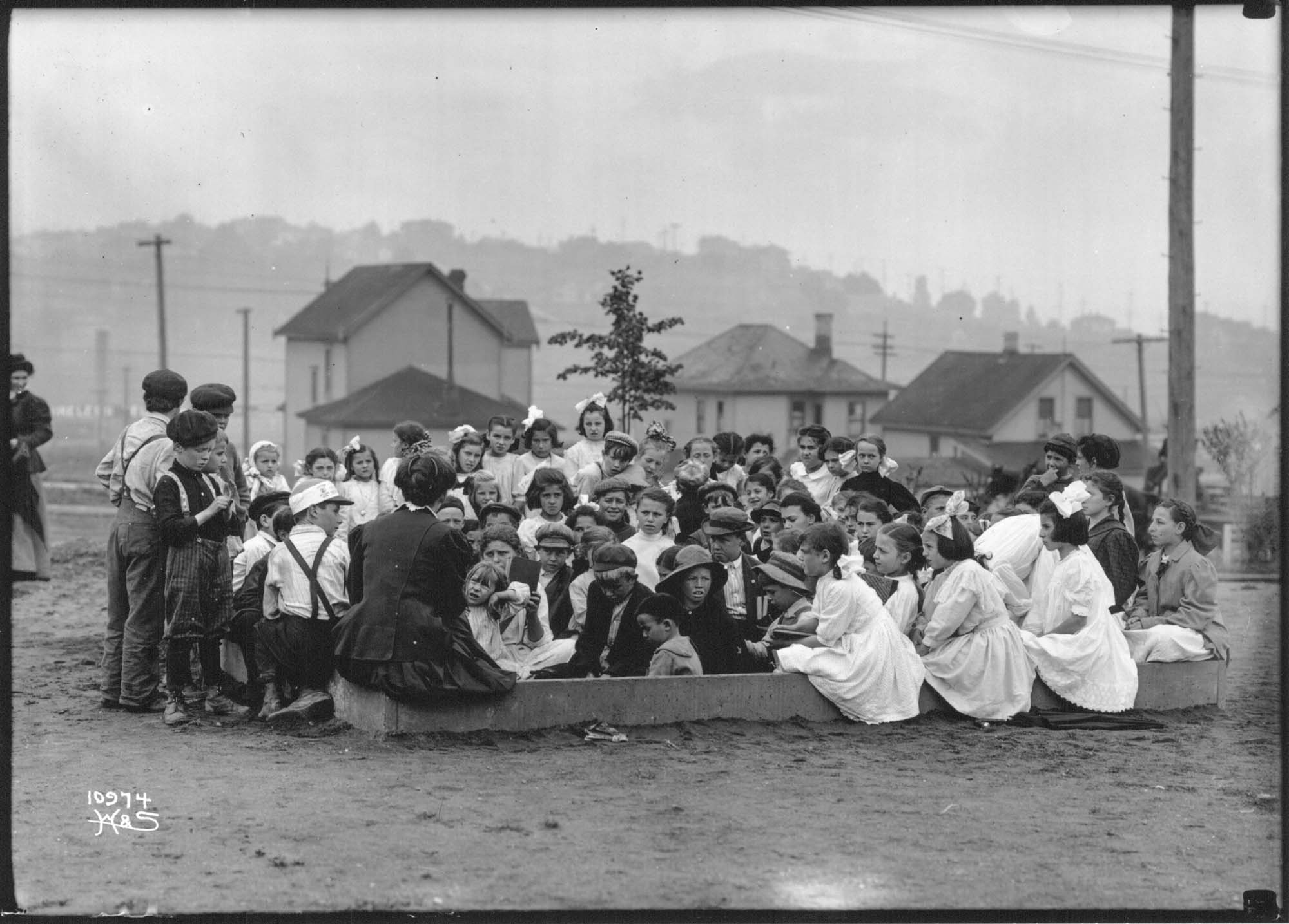 Image of Story hour at Collins Playground, Seattle, circa 1912