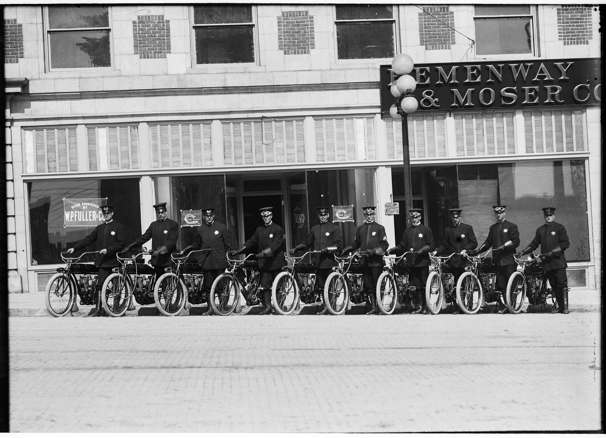 Image of Line of motorcycle police officers on Fourth Avenue, Seattle, circa 1915