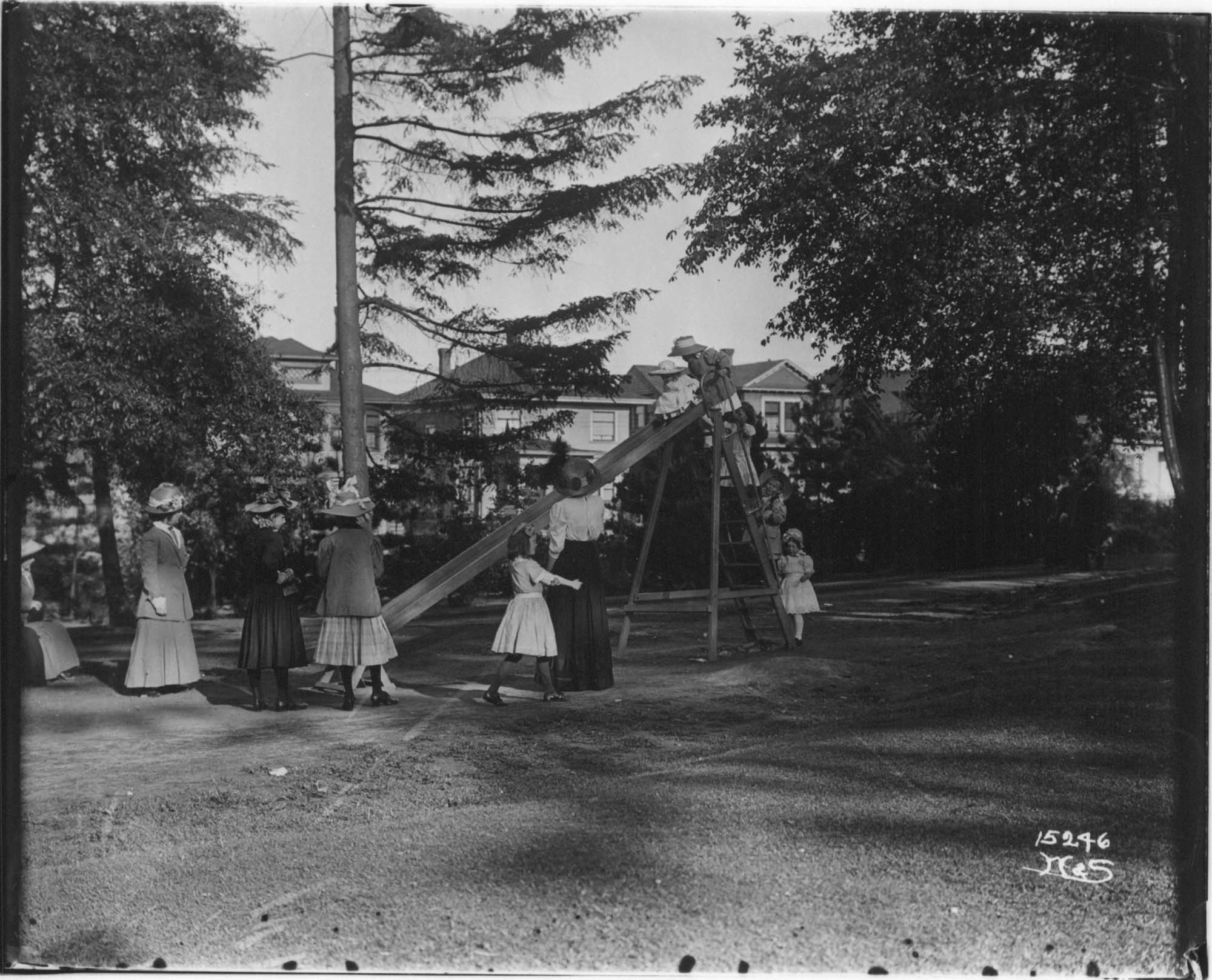 Image of Girls playing on slide, Seattle, circa 1910