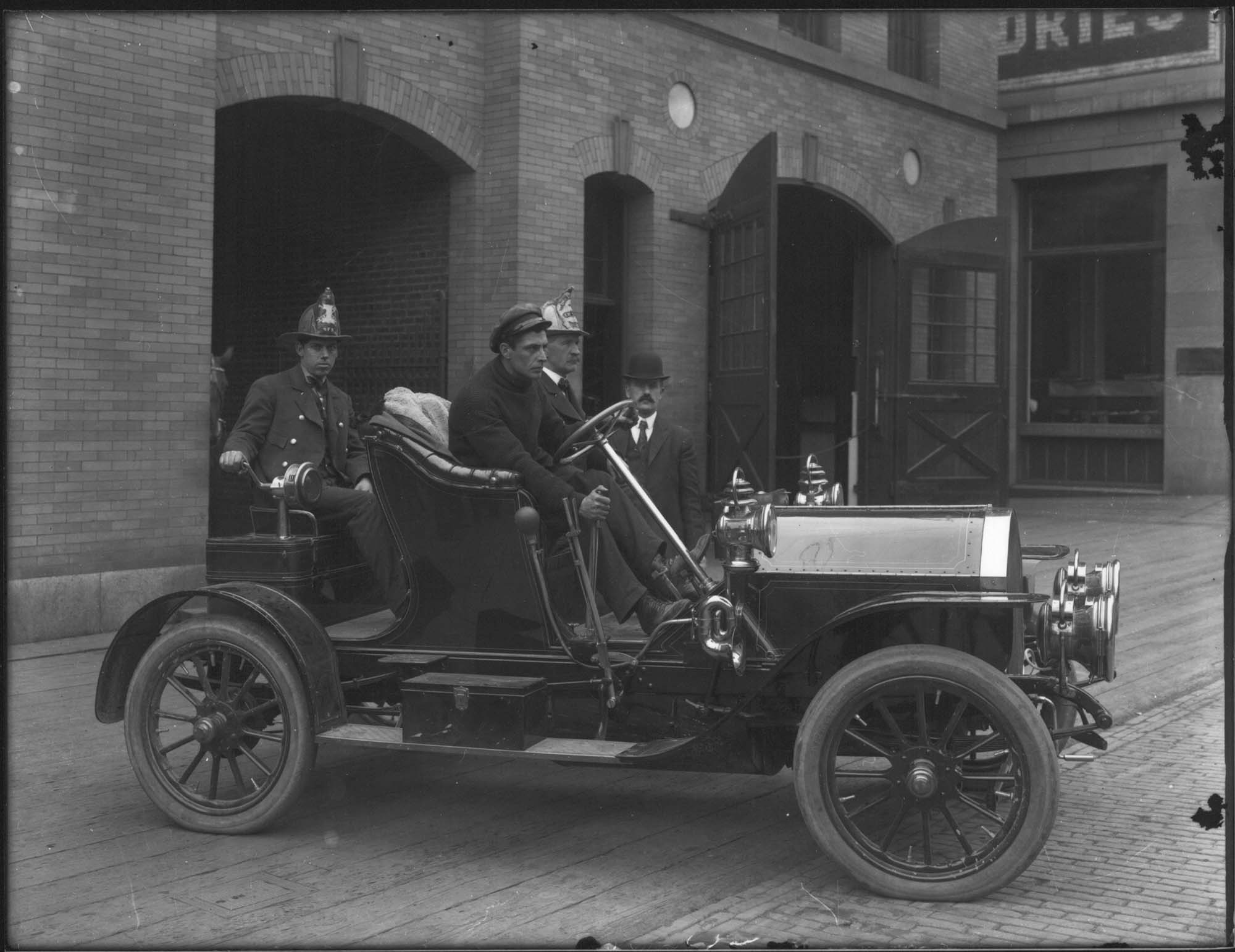 Image of Fire Chief's car outside Fire Station #10, Seattle, circa 1910