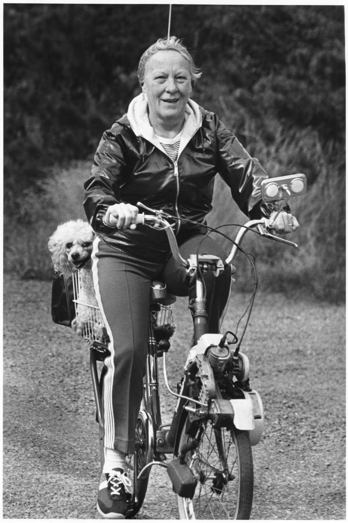 Image of Woman on bike, September 23, 1983