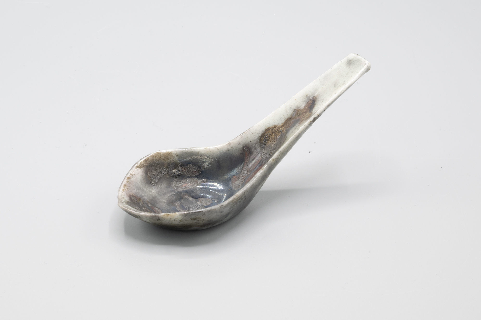 Image of Ceramic spoon that was burned in the Seattle Fire of 1889